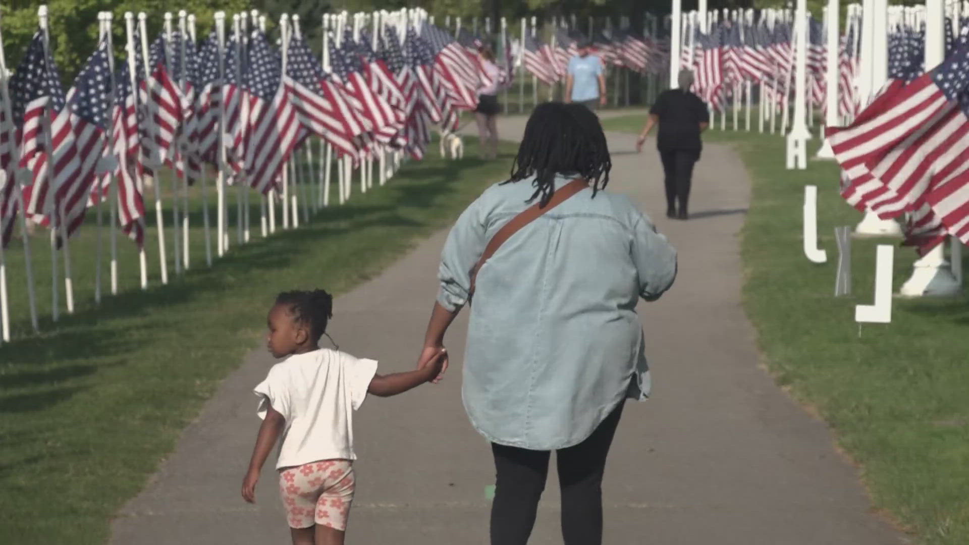 Hundreds of flags were placed in Cleveland's Edgewater Park as a sign of respect. Lydia Esparra's husband also dealt with the health effects from the rubble.