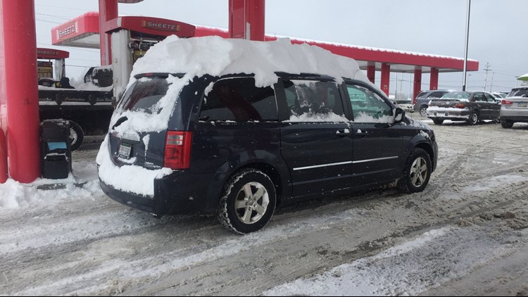 Are you required by law to clean snow off your car?