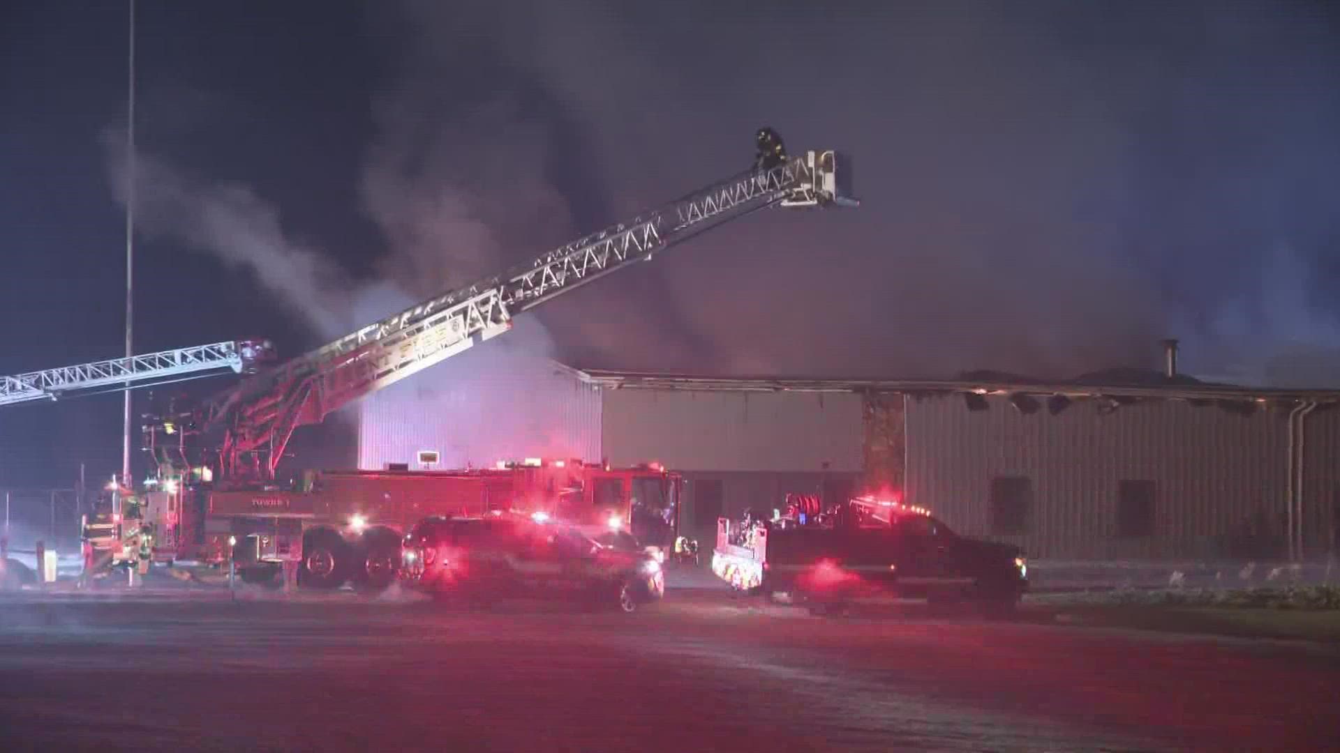 Flames can be seen through the roof of the building. No injuries have been reported at this time.