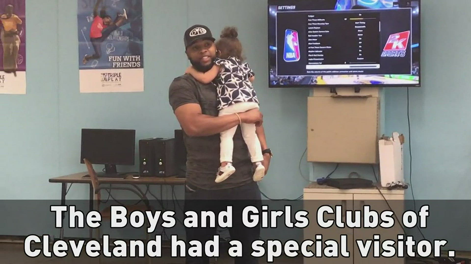 Cleveland Indians first baseman Carlos Santana visits the Boys and Girls Club of Cleveland.