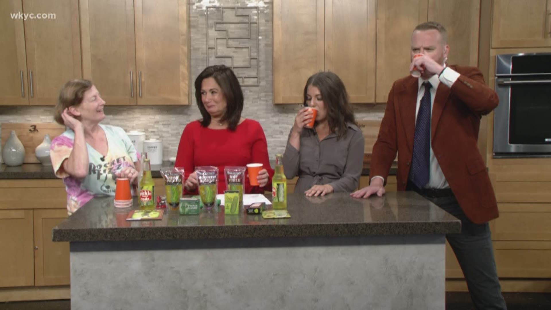 The Cleveland Pickle Fest is set for this Saturday.  Danielle Serino and Mike Polk Jr. try some pickle soda, which is among the products you can enjoy at the festival.