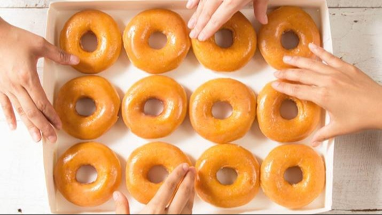 get-a-dozen-donuts-for-a-dollar-at-krispy-kreme-to-celebrate-their