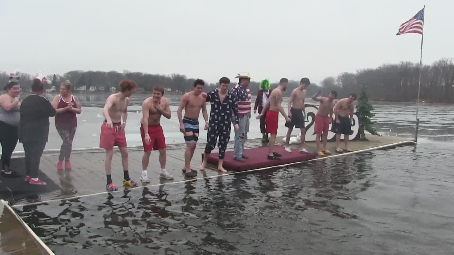 Feb. 23, 2019: Although it was a cold, cloudy winter afternoon, more than 650 people packed the beach at Portage Lakes State Park to go for an icy swim. These brave souls traded their winter coats for bathing suits and flip-flops Saturday at the 16th annual Portage Lakes Polar Bear Jump, which raised more than $125,000 for the Akron-Canton Regional Foodbank.