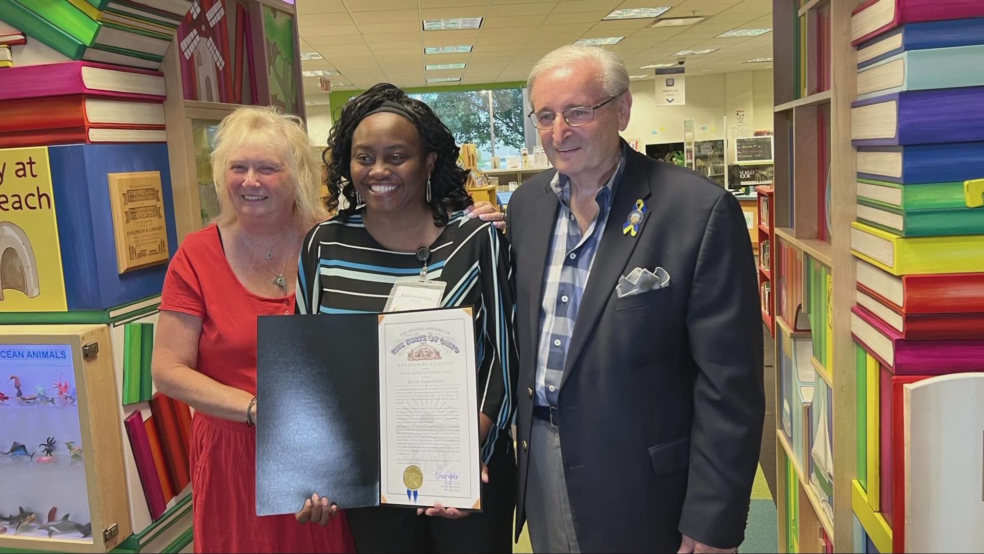Kacie Armstrong has been walking the isles of libraries for more than a decade, and now she's being recognized for her hard work and dedication.