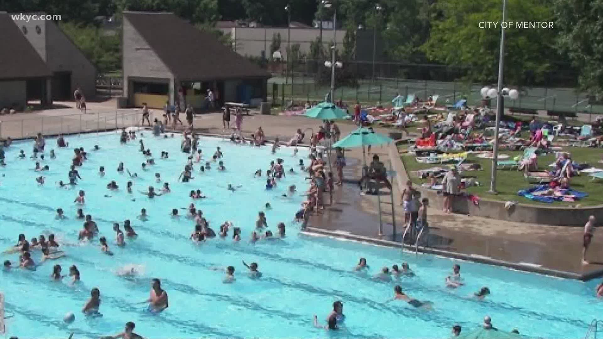 Pools will be allowed to reopen at the end of the month, but many cities are hesitating. Lynna Lai reports.