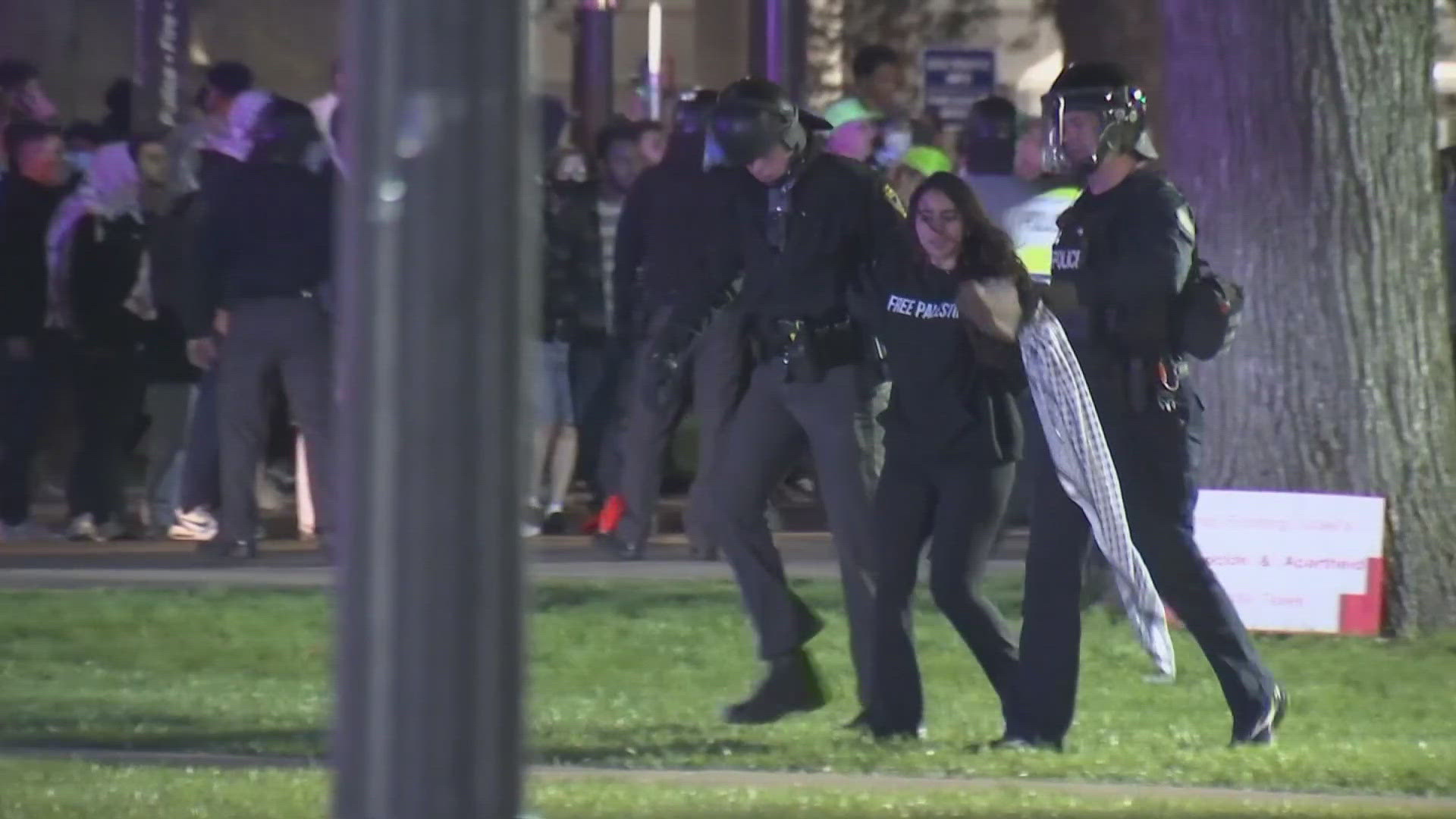 Police moved in around 10 p.m. Thursday as more than a dozen people are seen being taken into custody.