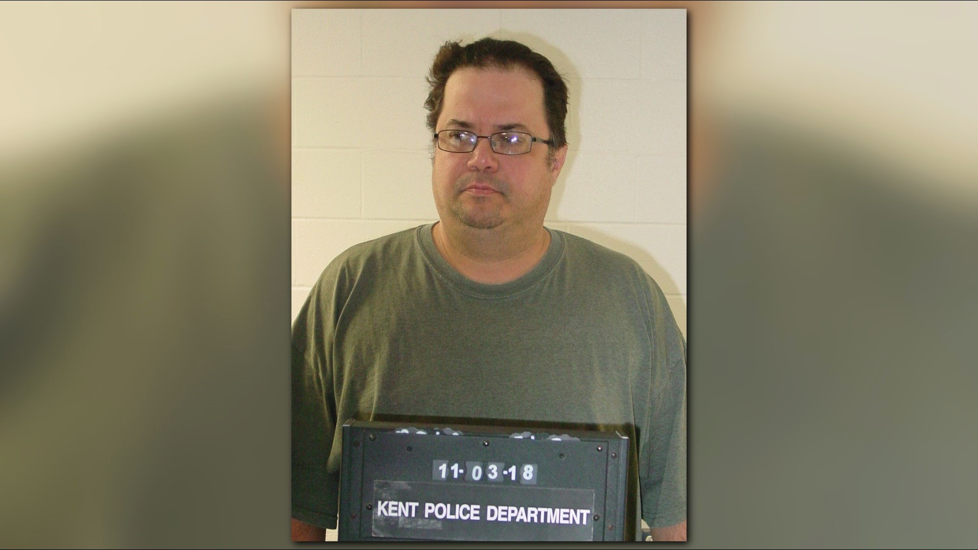 Kent police arrest man accused of fondling sleeping woman | wkyc.com