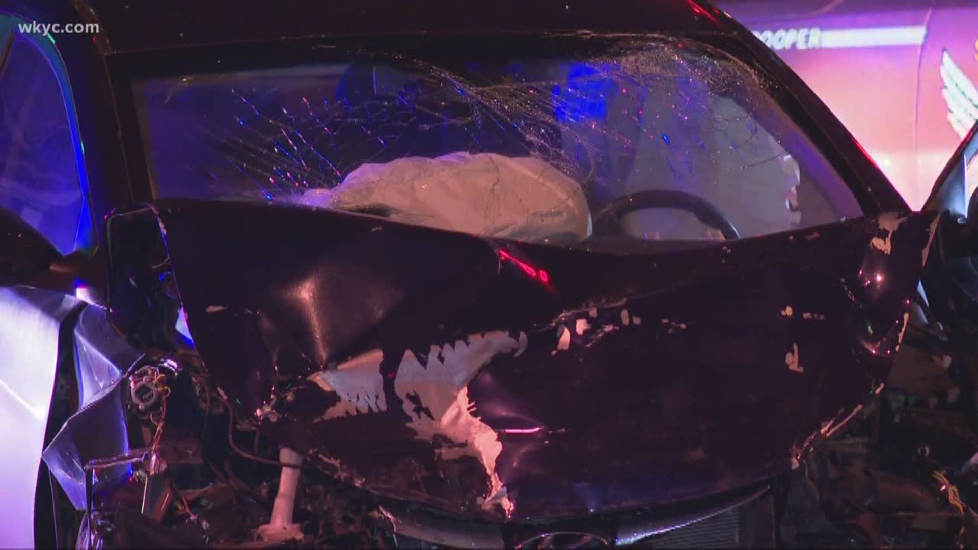 2 people injured after car is rammed by vehicle fleeing police; suspect at large