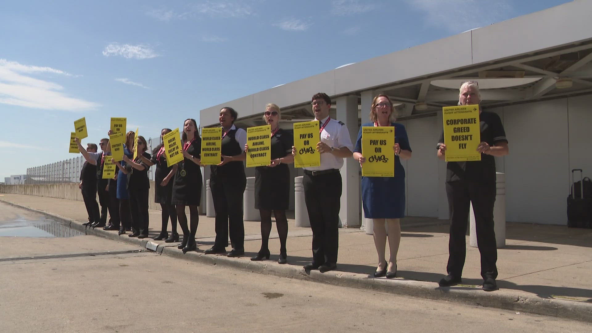 Off-duty union attendants from United were seen chanting and holding signs Wednesday outside Cleveland Hopkins Airport, demanding a better contract.