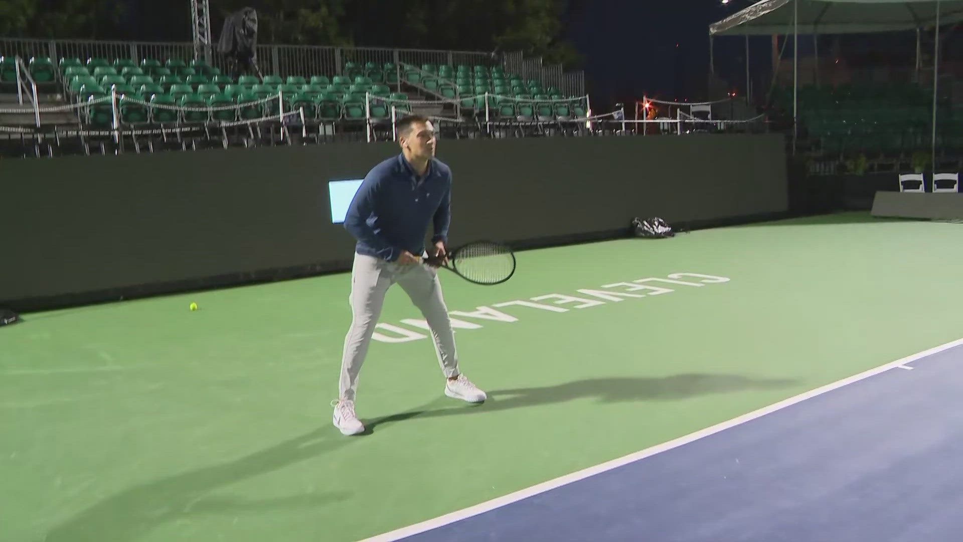 3News' David Greenberg tests out the tennis court at Tennis in the Land, which is currently underway in Cleveland.