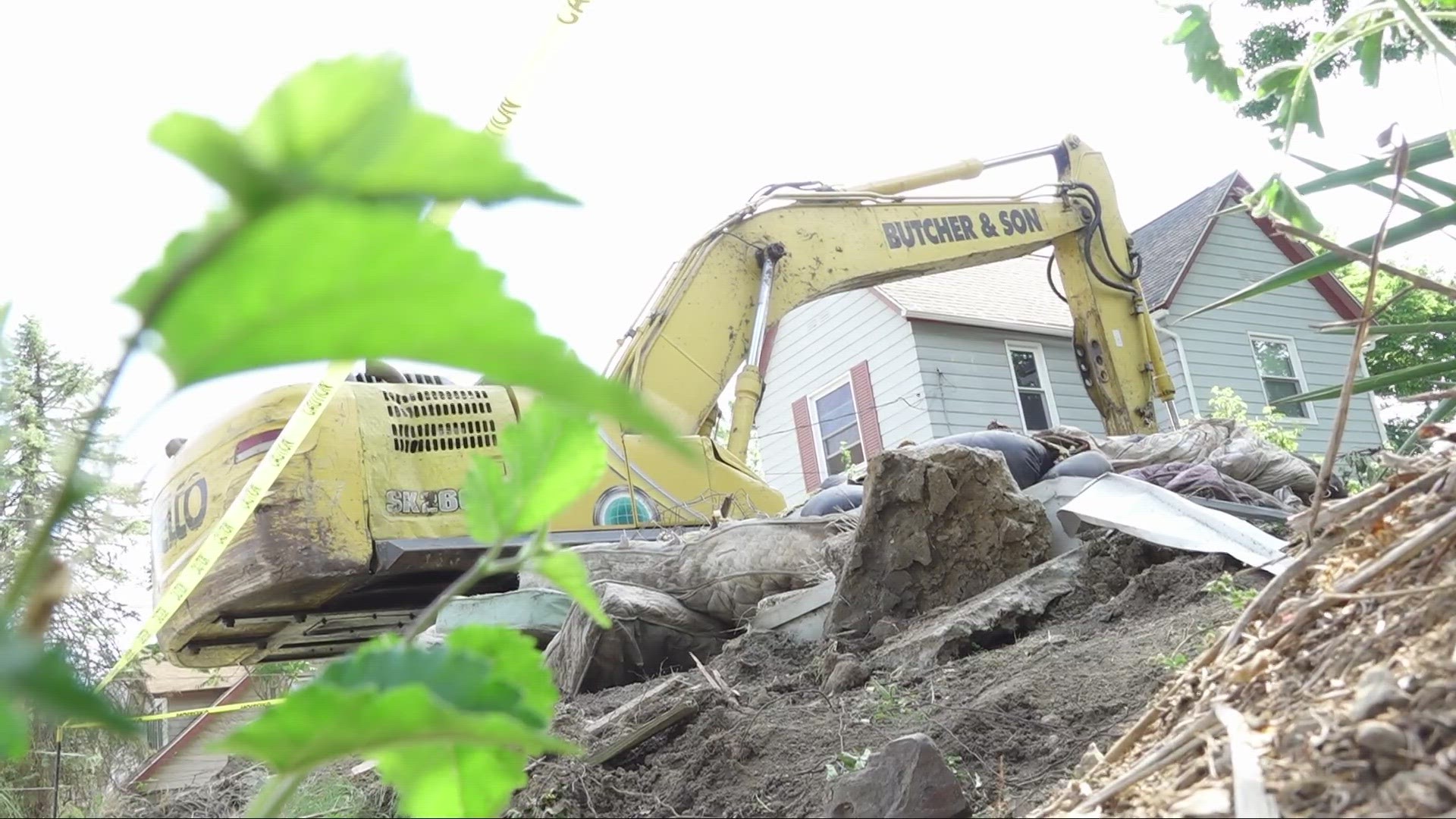 Human remains were found in a vacant house that was demolished in Akron on Thursday.