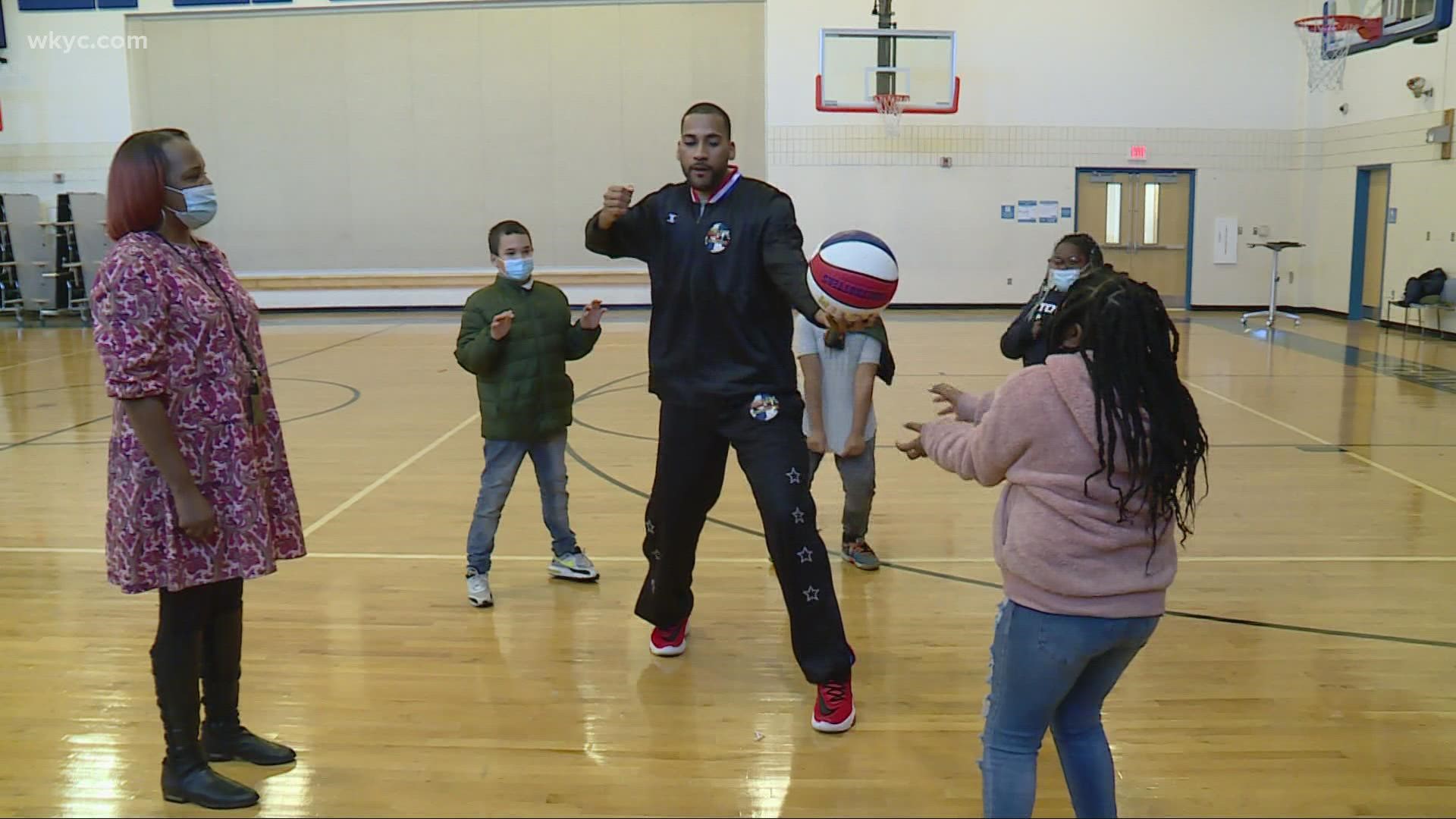 Students received gifts from 3News, and spent time with a local author and an international basketball star before holiday break.