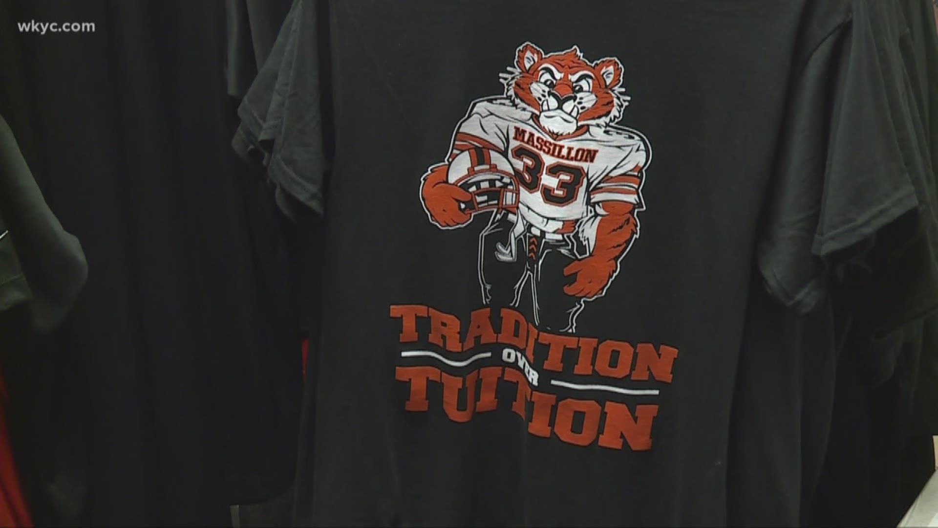 A local t-shirt compnay is cashing in on an old rivalry. However, everyone isn't happy with the products.