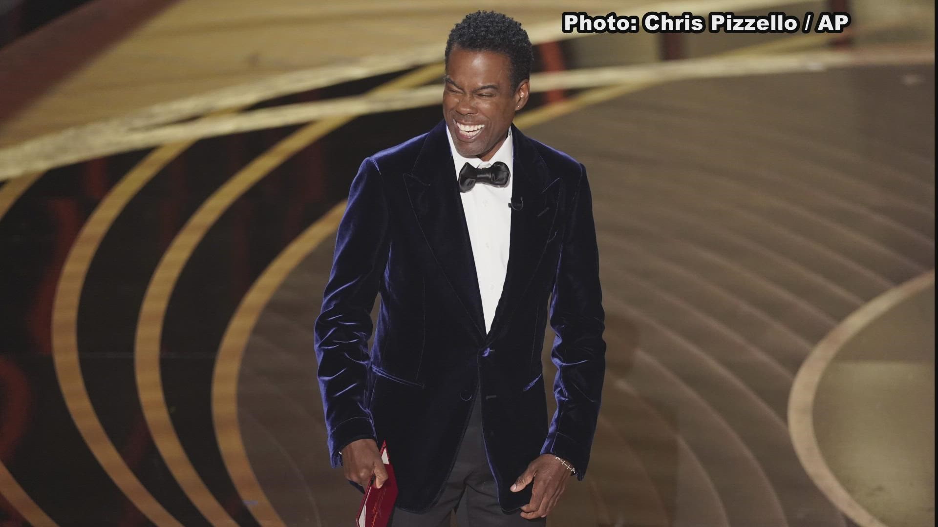Here are images of the moment Will Smith smacked Chris Rock on stage at the Oscars.