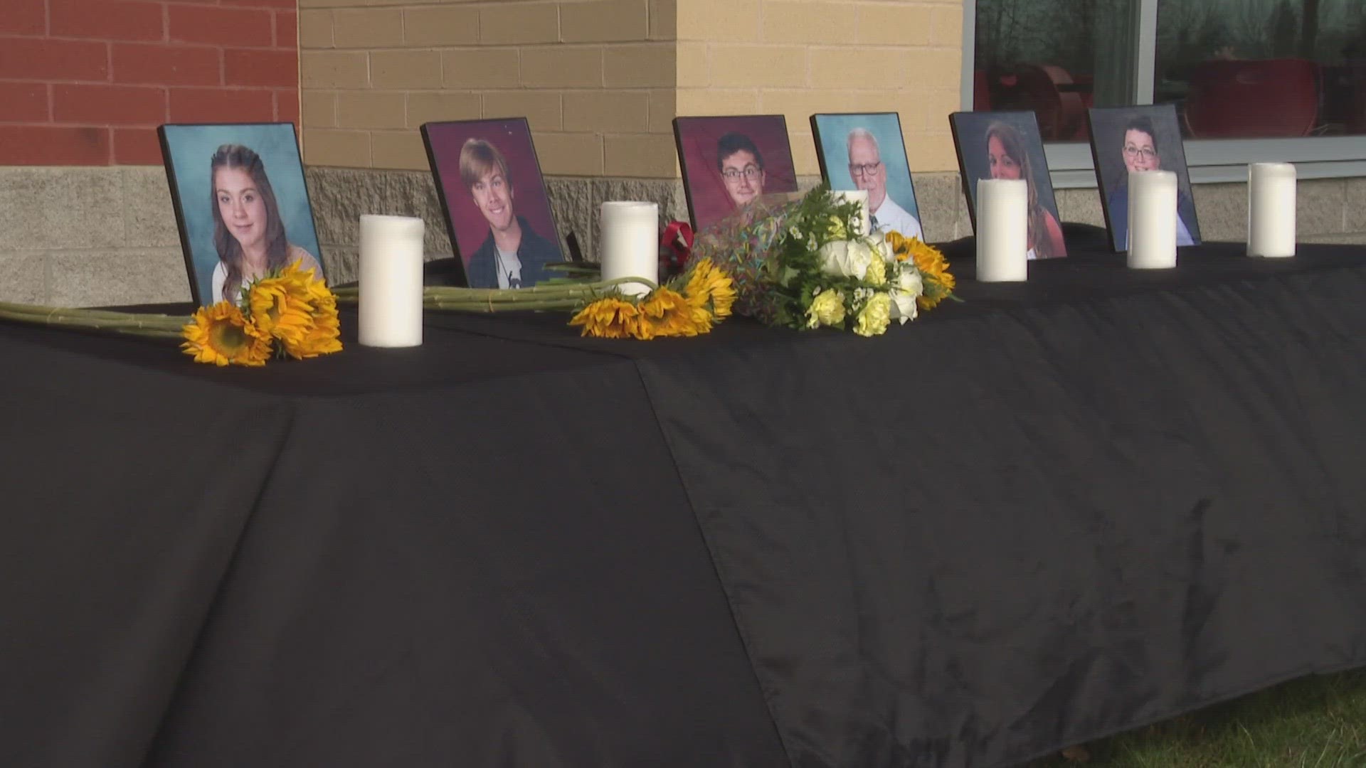 The community gathered for a vigil Tuesday night after three high school band members and three adults — including a teacher — lost their lives.