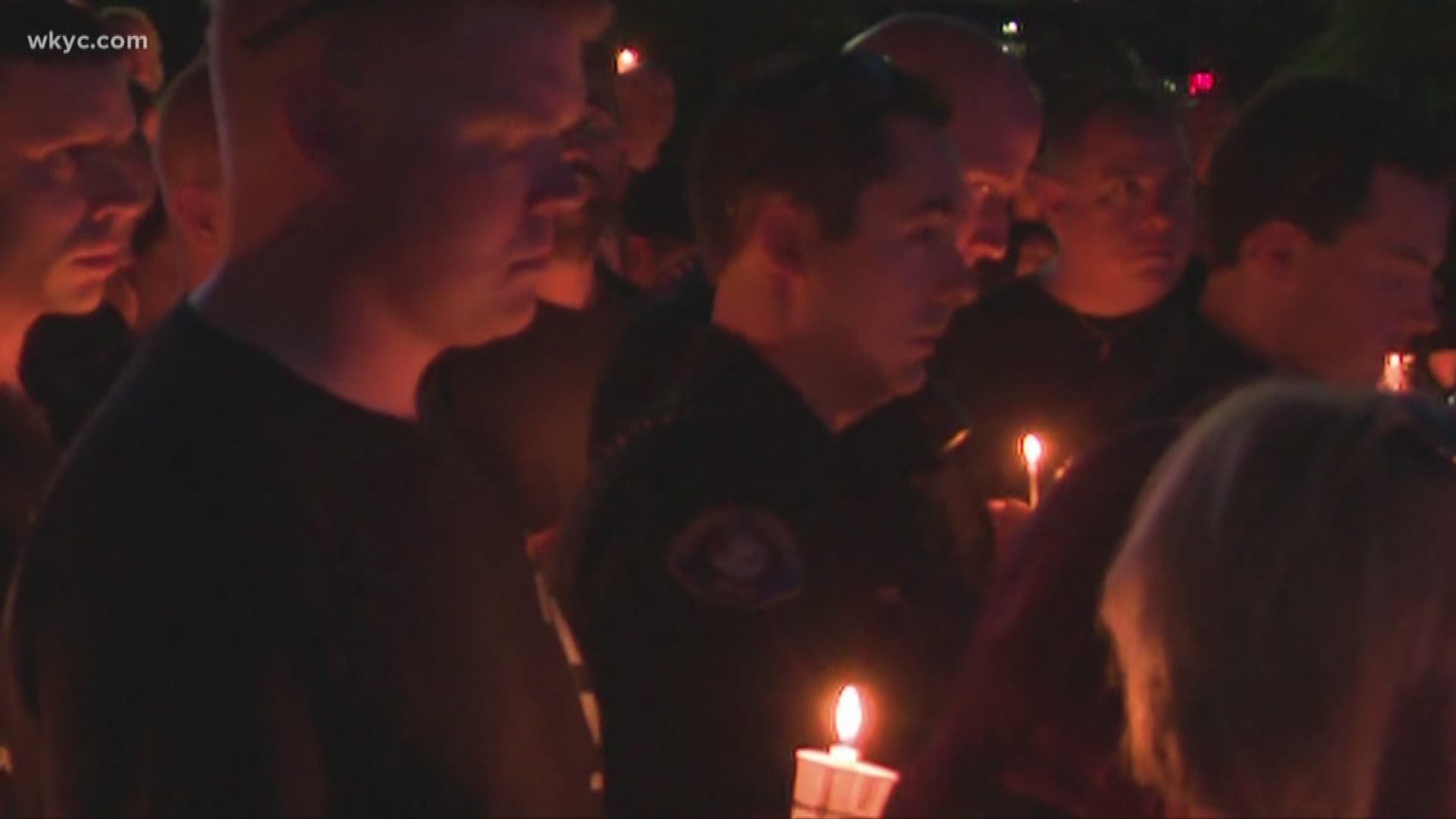 Community honors life and service of fallen Mentor police officer at candlelight vigil