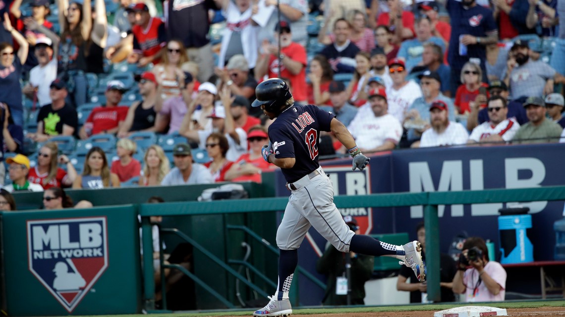 CLEVELAND, OH - MAY 26: Cleveland Indians shortstop Francisco Lindor (12)  wears a special camouflage socks uniform for Memorial Day Weekend during  the first inning of the Major League Baseball game between