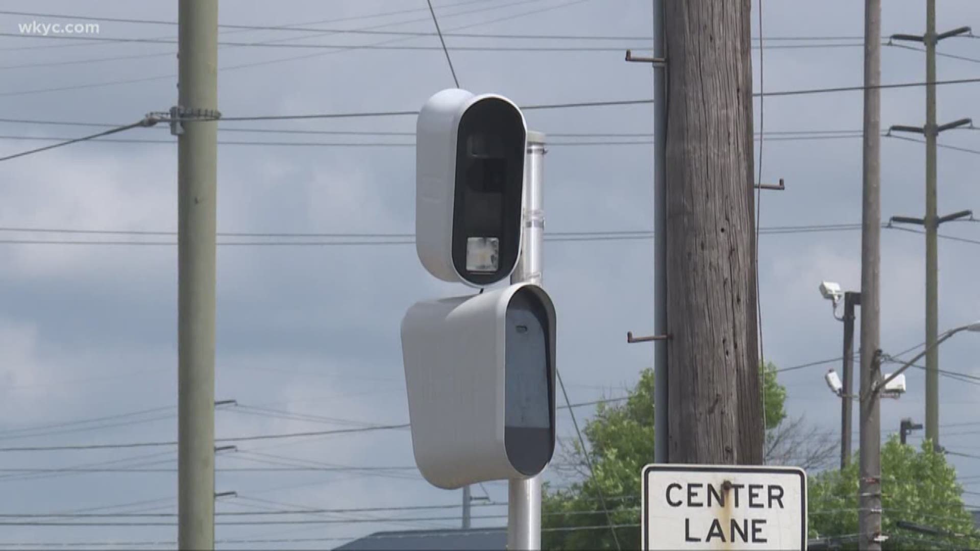 A new law signed by Gov. Mike DeWine takes away funding from localities who continue to use such cameras. Brandon Simmons reports.