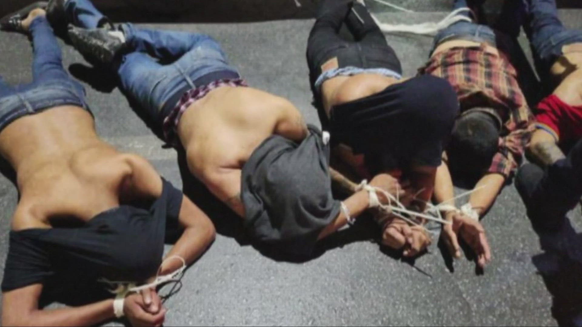 A photograph of five men face down on the pavement and bound accompanied the apology letter.