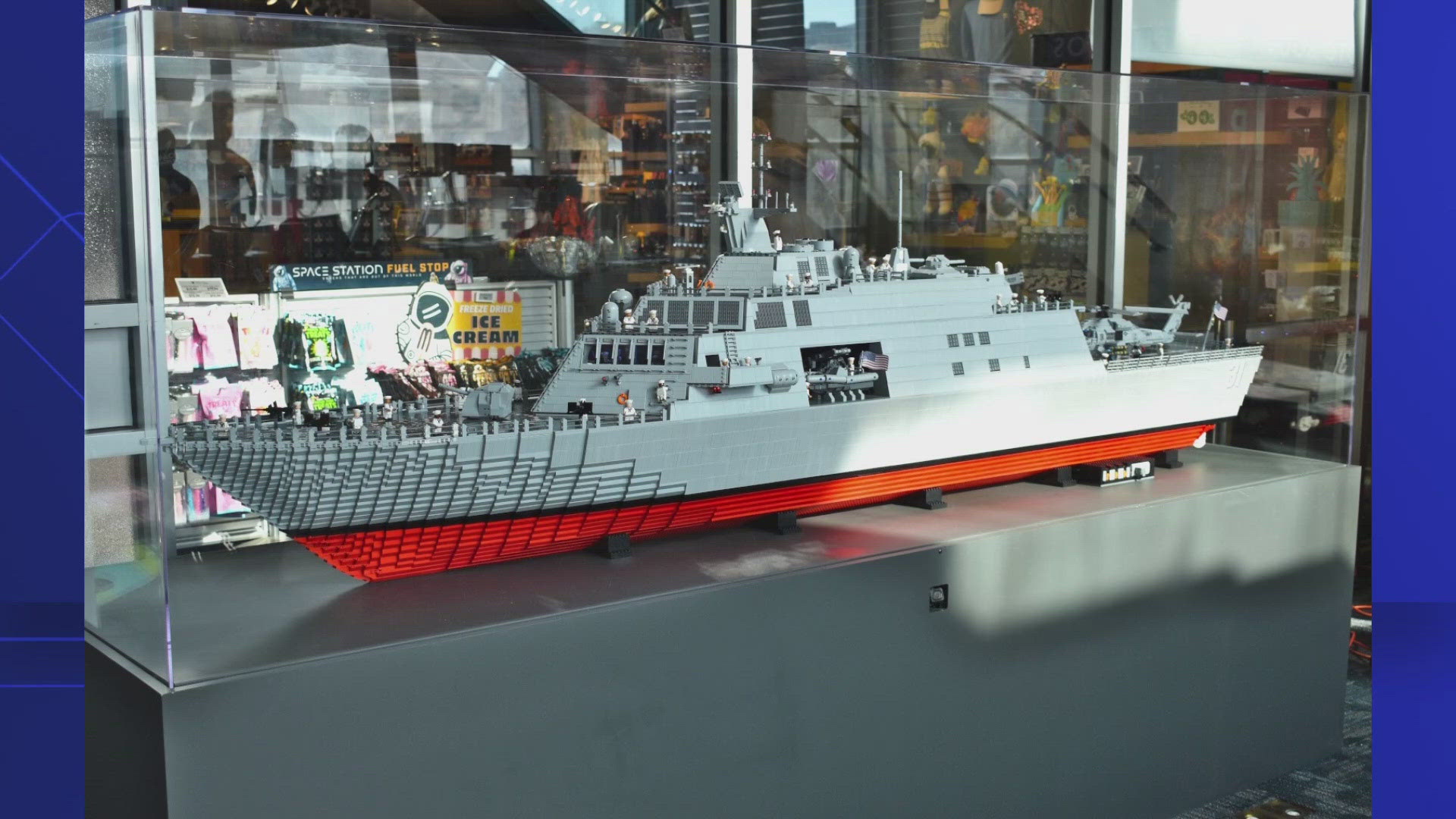 Over 36,000 Legos were used to build the model of the USS Cleveland, measuring 8 feet long, 1.5 feet wide and 2.5 feet tall.