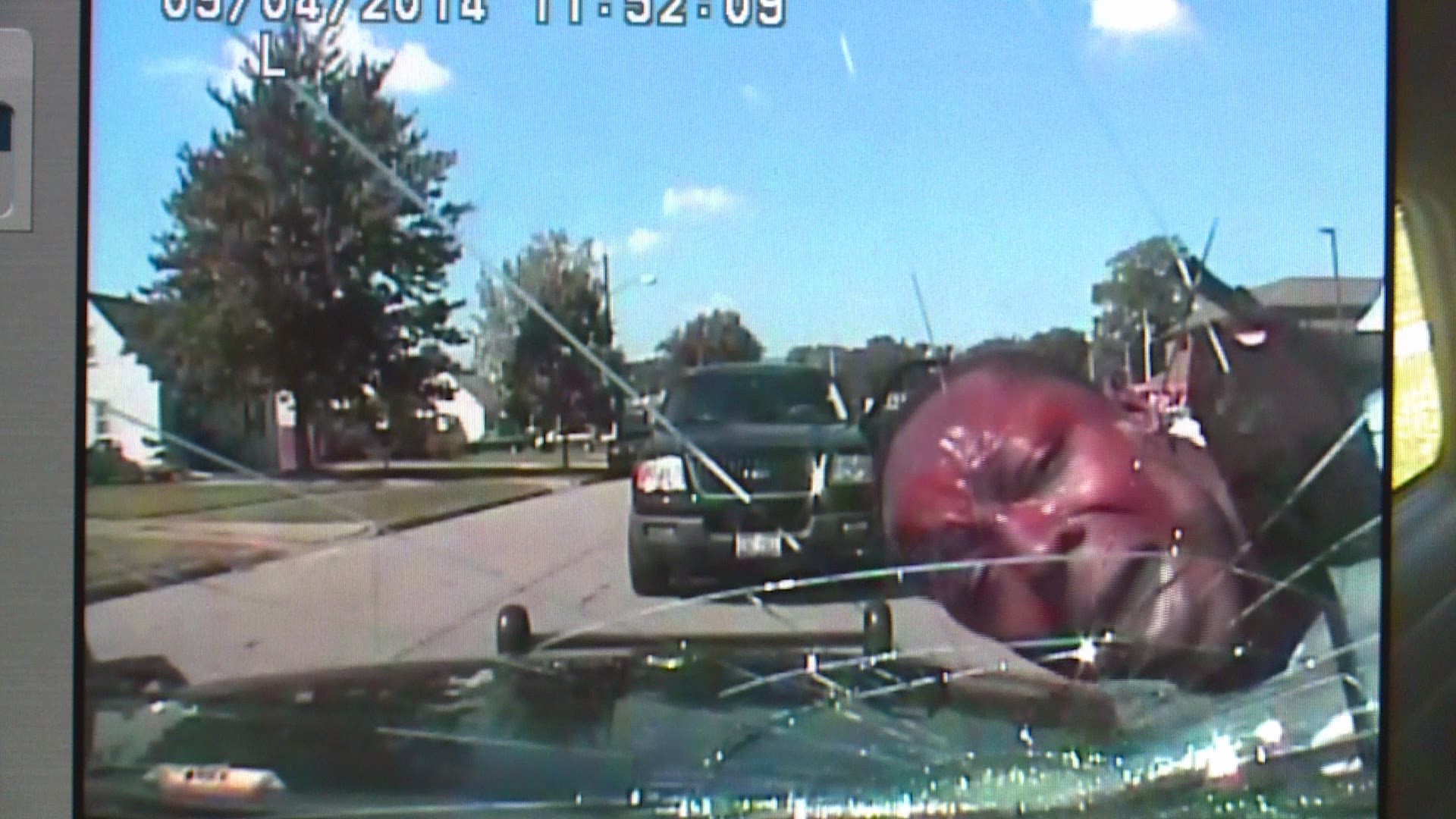 Cop cracks windshield with suspect's head