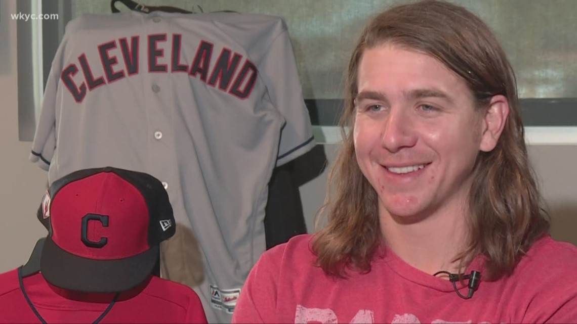 Cleveland Indians 'Sunshine' Mike Clevinger, heading to the Indians dugout  after warming up before the game a…