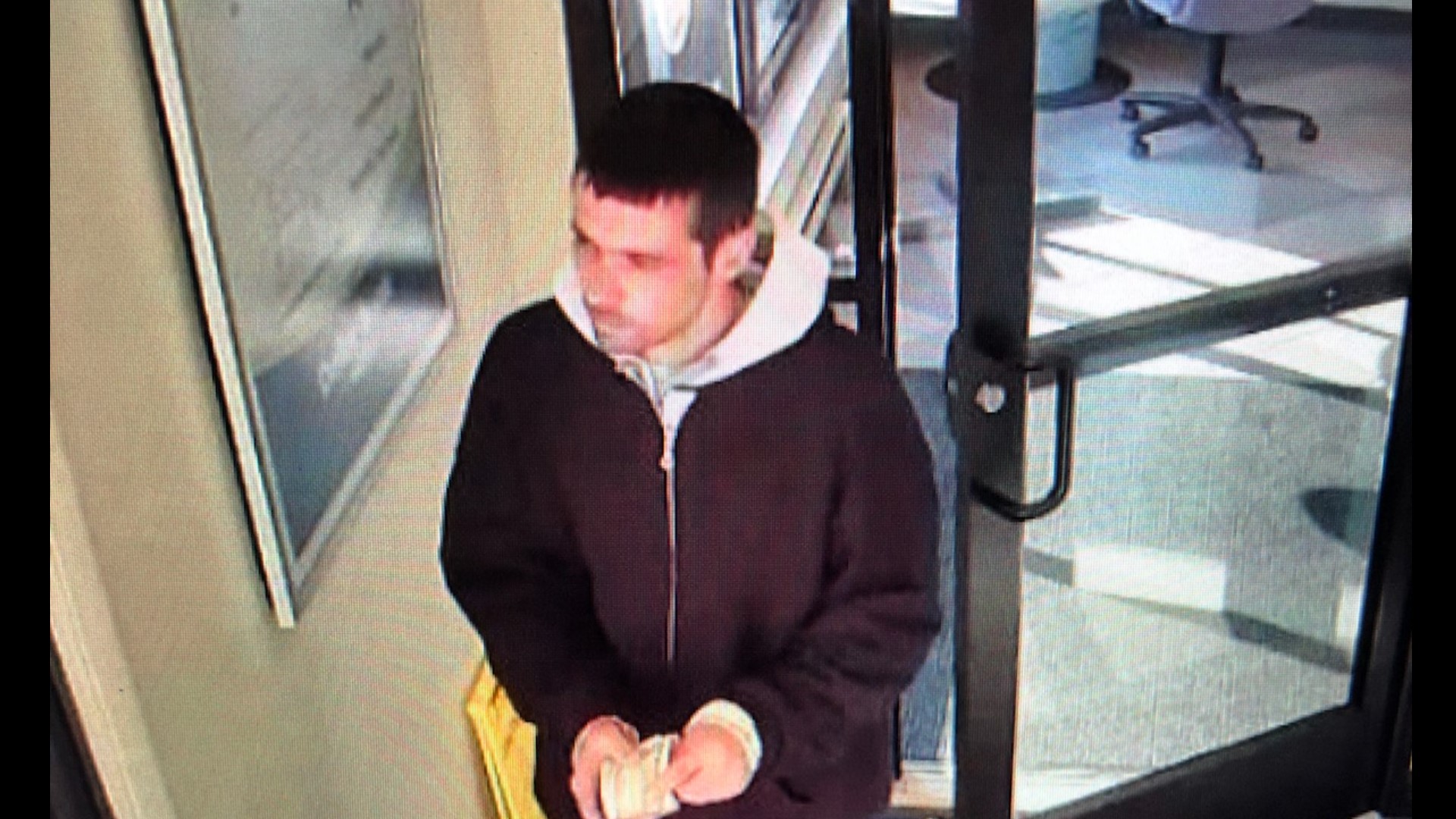 FBI searching for suspect who robbed Dollar Bank in Cleveland | wkyc.com