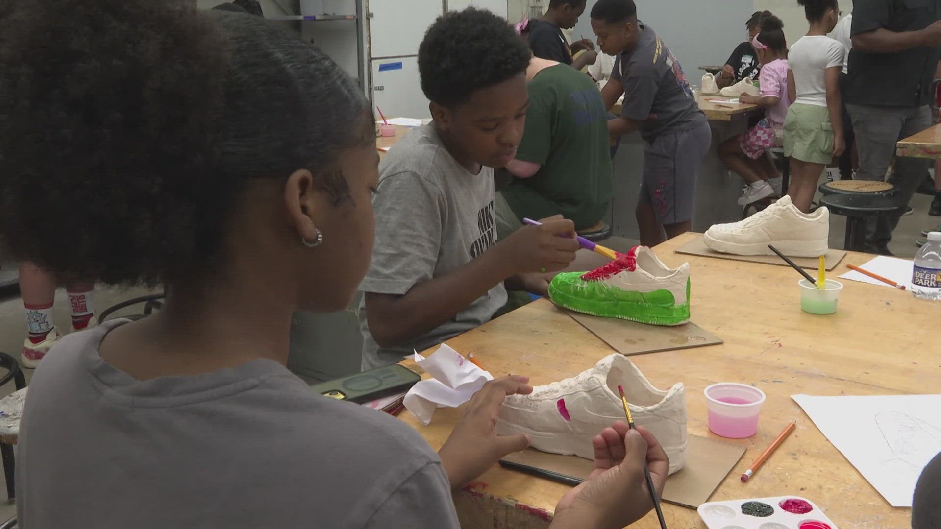 Local middle school students at Akron's Sneaker Camp explore STEM ideas through sneaker culture, design and creativity.