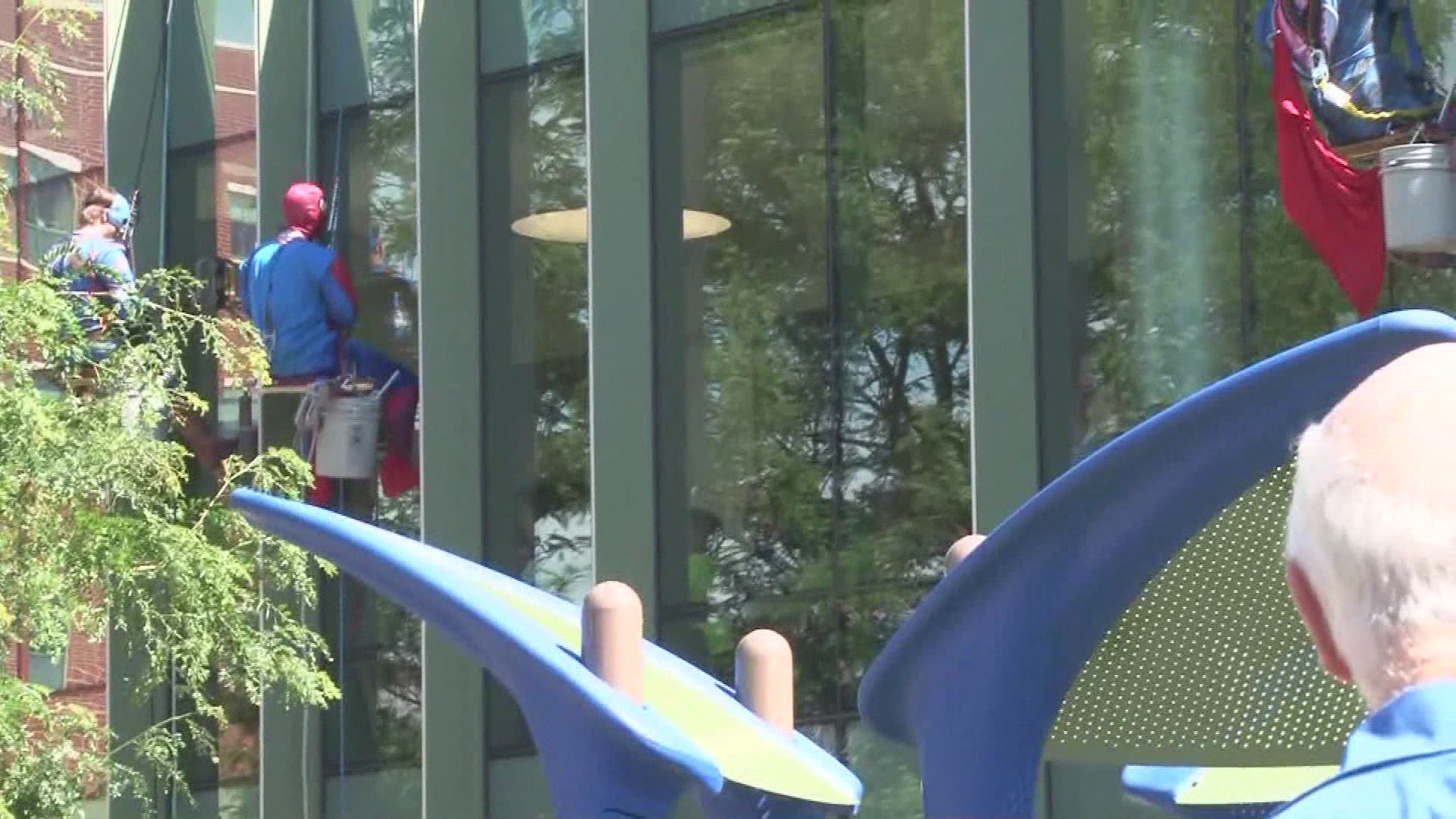 A group of super heroes dropped in for a special surprise outside Akron Children's Hospital.