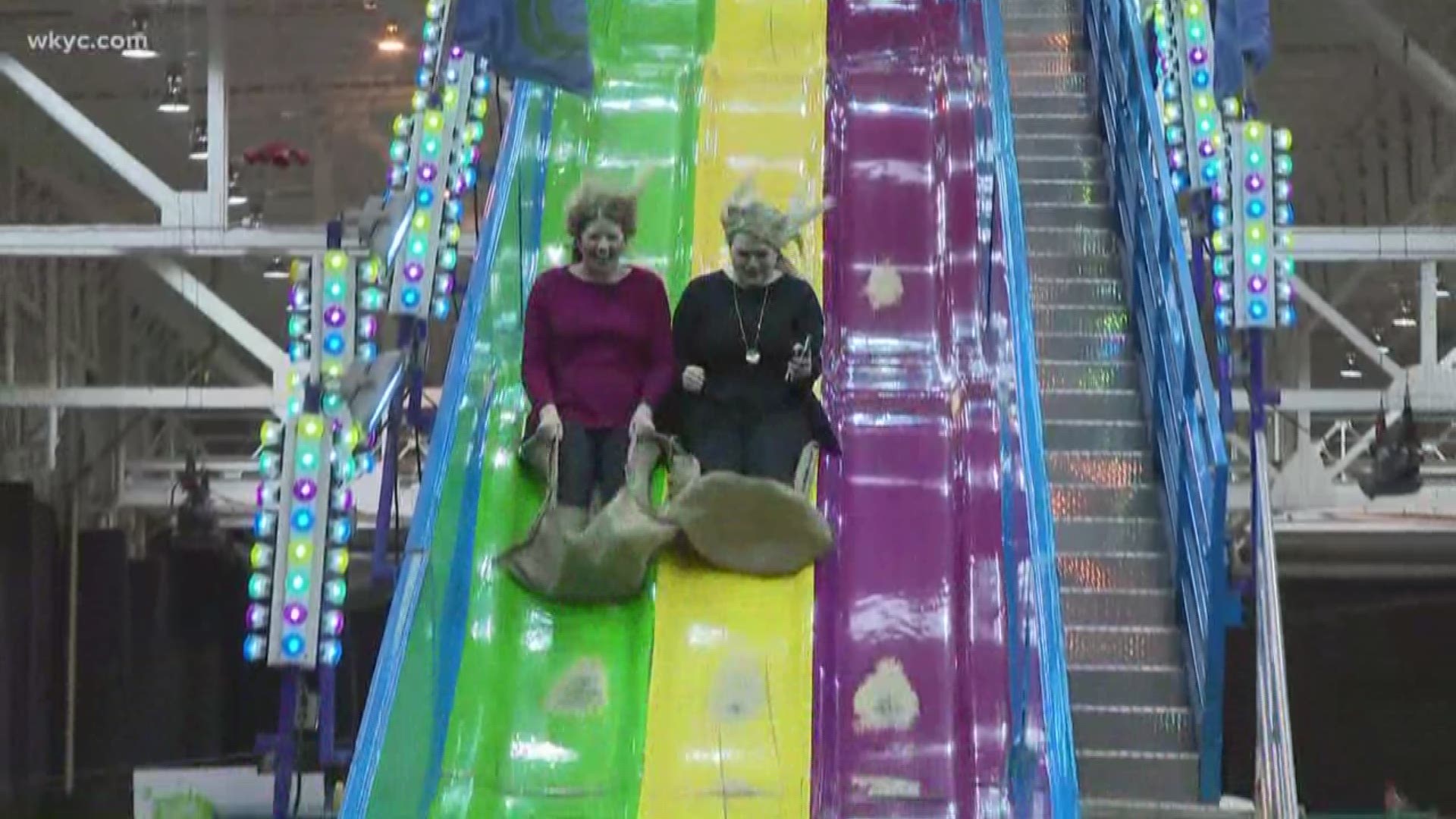Lindsay and Claire (I-X Center) take a ride down the Fun Slide at the I-X Indoor Amusement Park