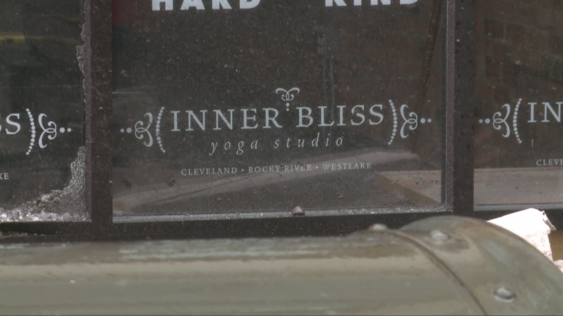 A woman was cut from her vehicle after crashing into a downtown yoga studio
