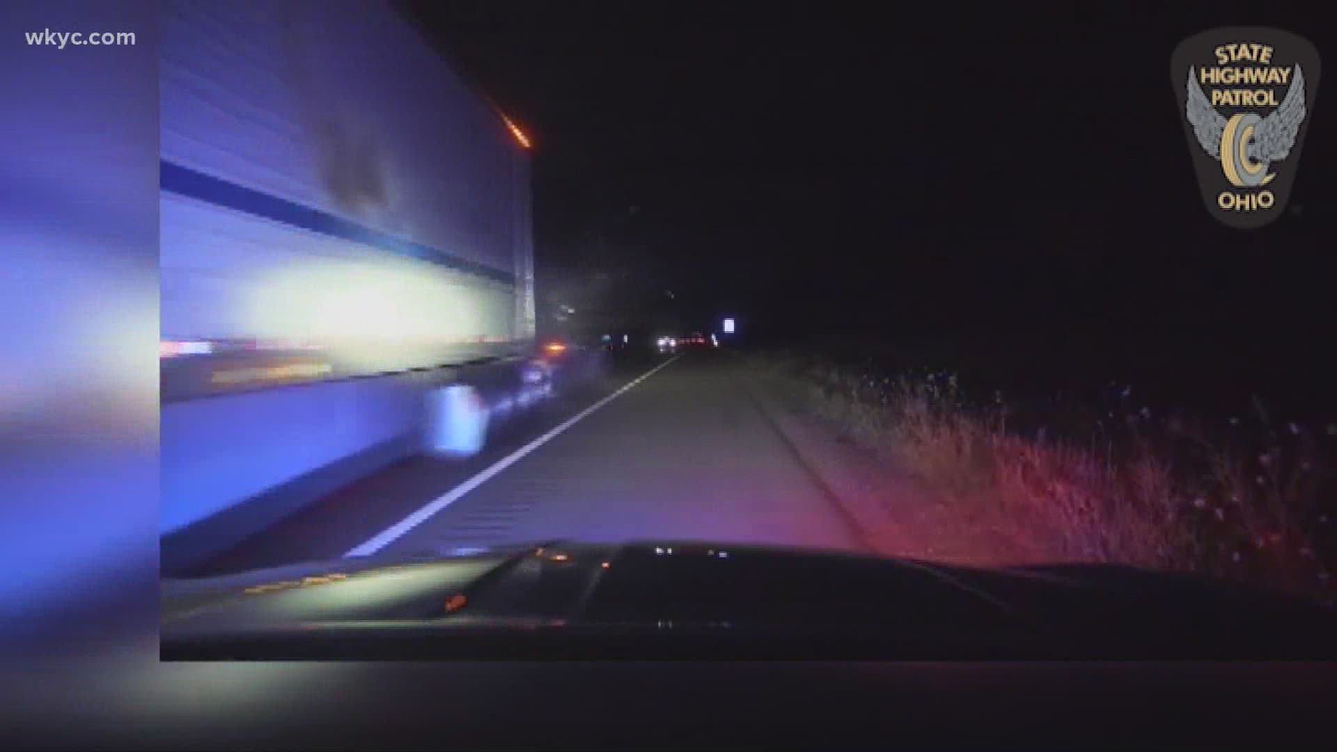 Dash cam footage from the OSHP shows the moment a semi truck slammed into an SUV that had stopped in the road, after being pulled over. Four people died in the crash