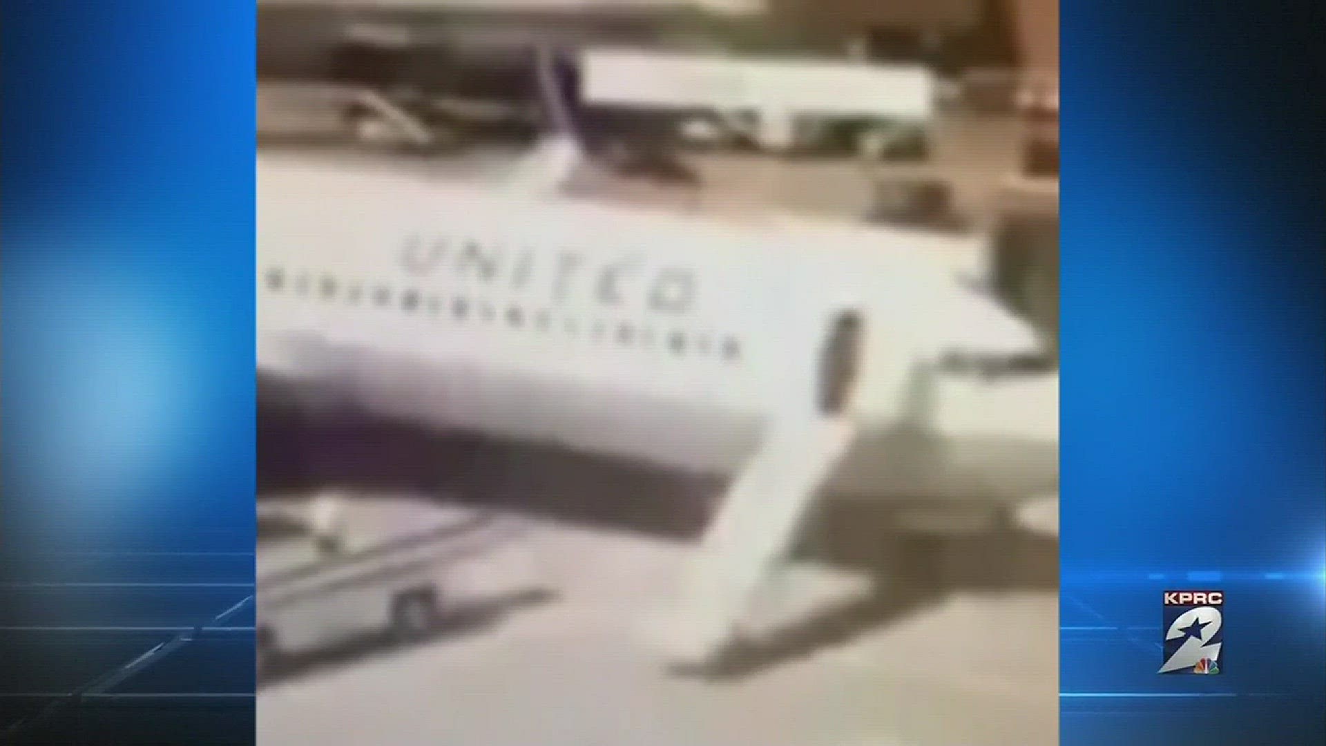 April 5, 2016: Video shows a United Airlines flight attendant opening a plane door and unexpectedly jumping down the emergency slide.