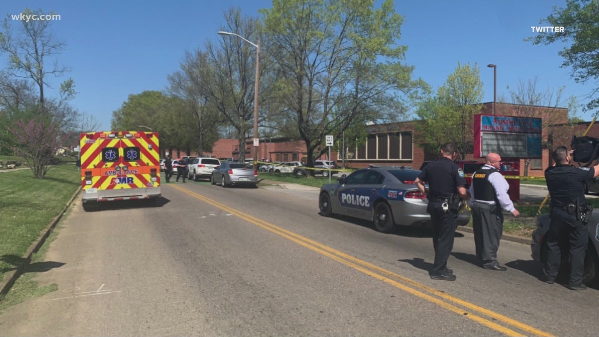One male was pronounced dead at the school. The KPD officer has non-life threatening injuries.