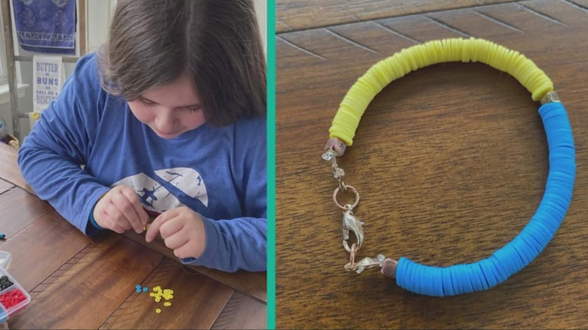 For the last few weeks, Molly Catalano has been crafting homemade yellow and blue bracelets in an effort to raise money for those impacted by the war in Ukraine.