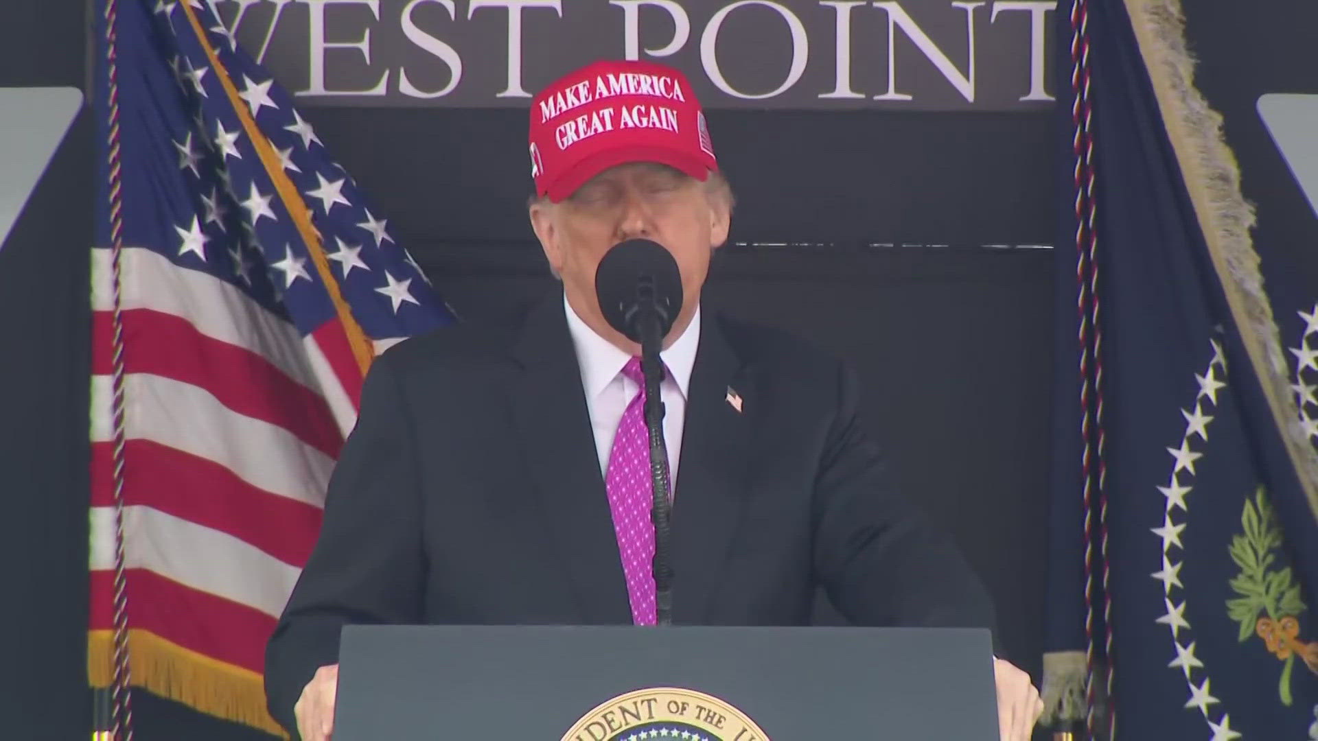 Wearing a red “Make America Great Again” hat, the Republican president told the 1,002 graduating cadets that “you came from excellence, you came for duty.”