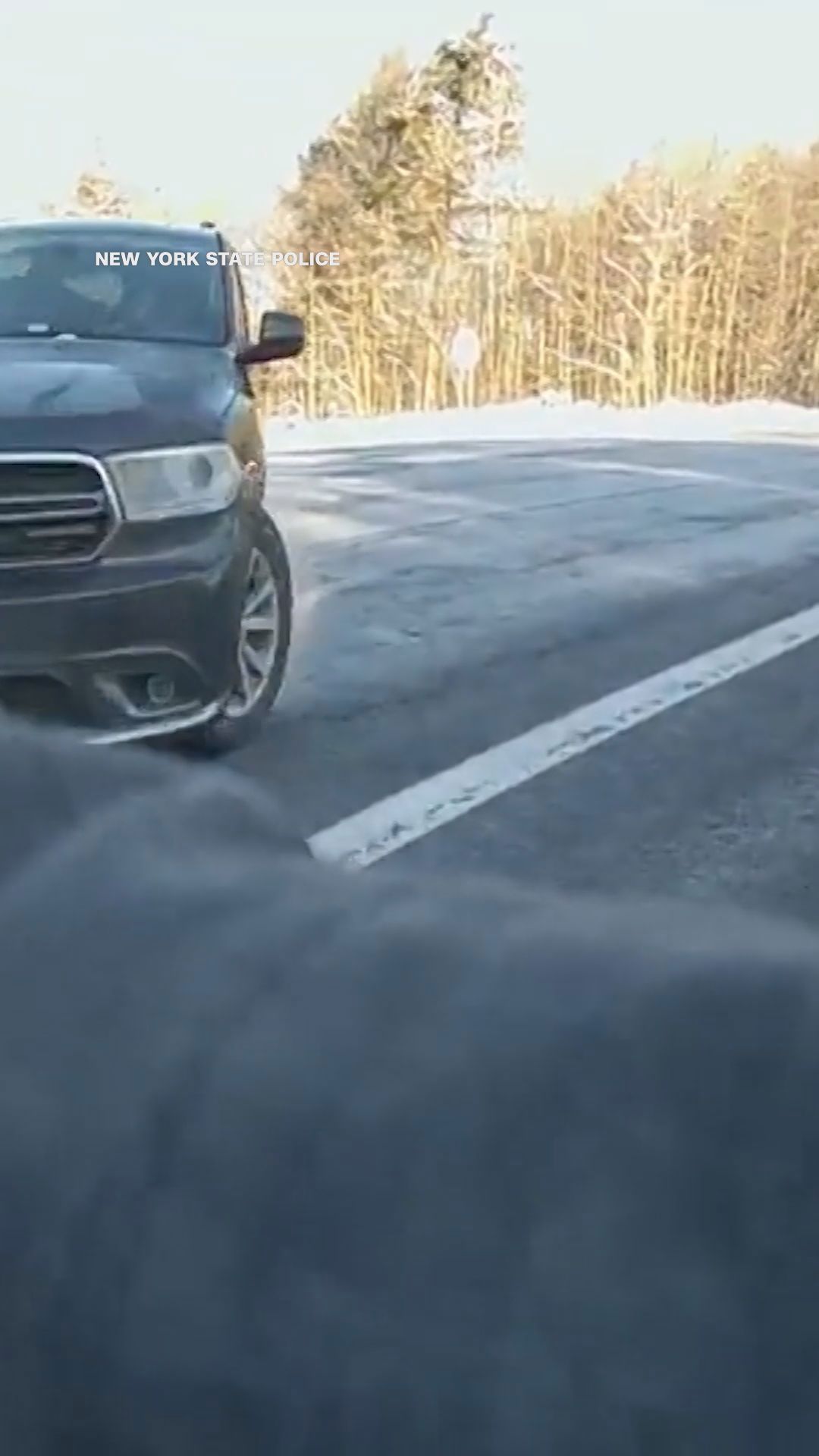 Horrifying moment as SUV slams into state trooper's patrol car | wkyc.com