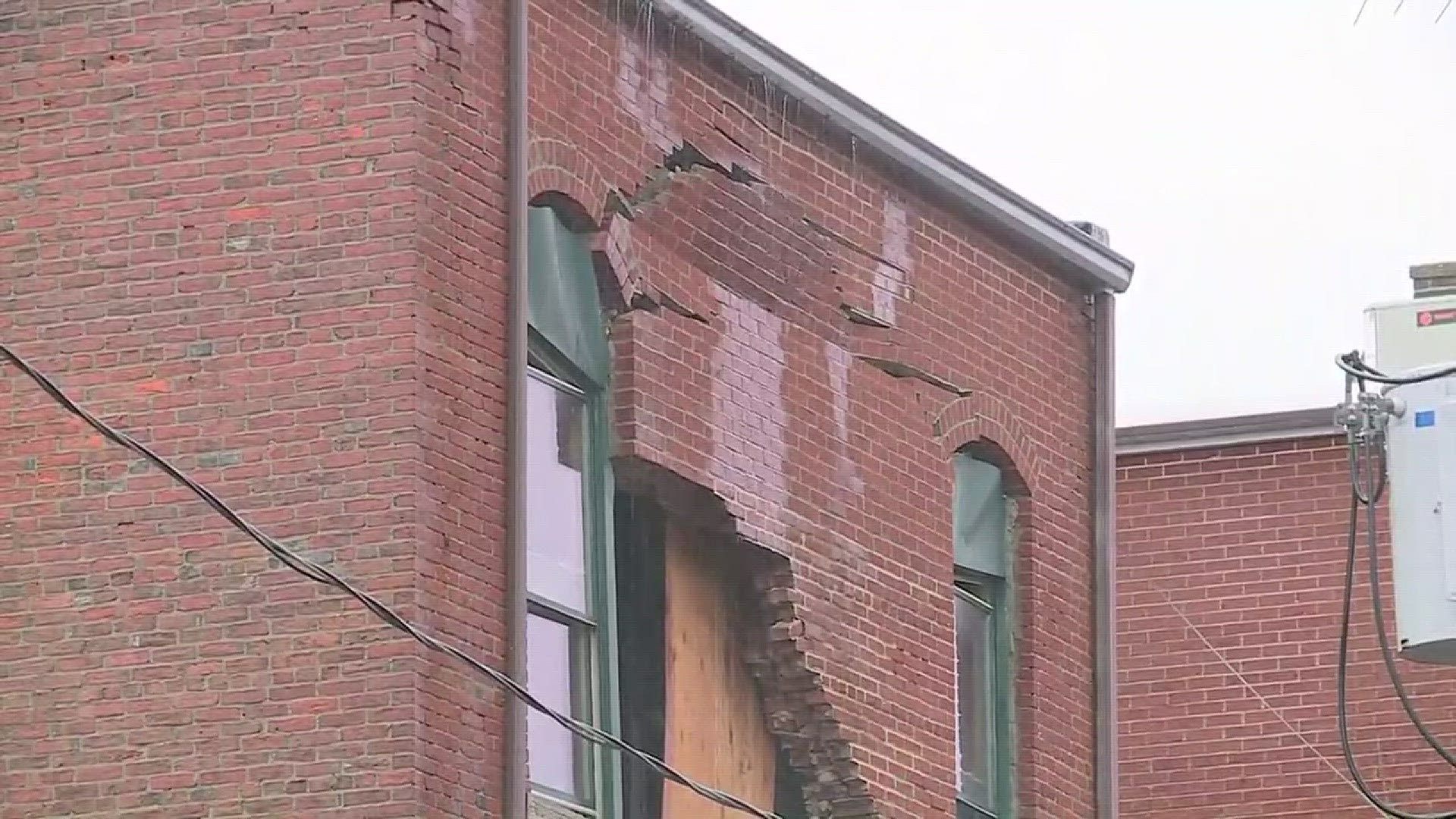 After a partial collapse, siding of a brick building fell on Court Street in Medina.