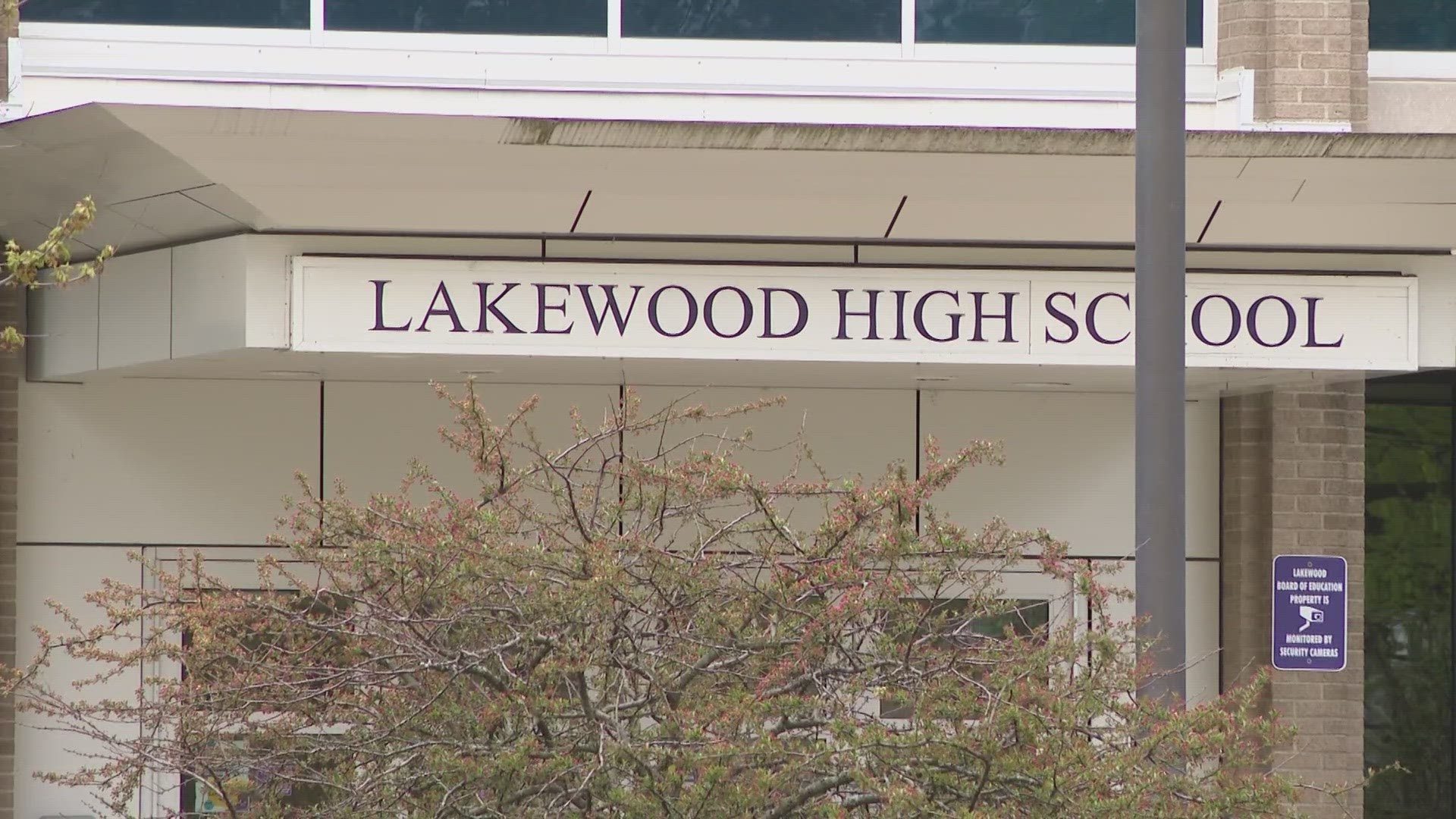 Lakewood High School officials say the former student was charged with possession of a deadly weapon (knife) on school property.