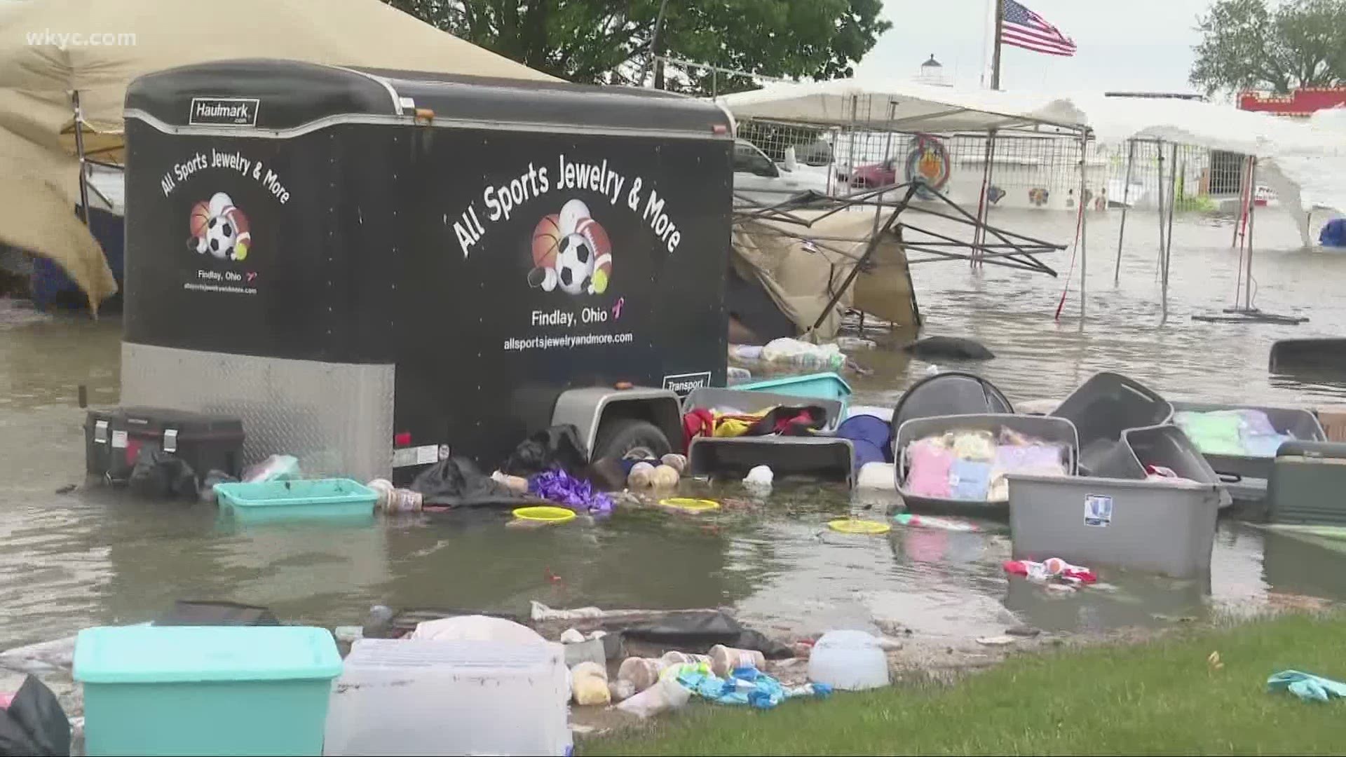 Put-in-Bay officer rescues family stranded by high water; ferry service canceled to Lake Erie islands.