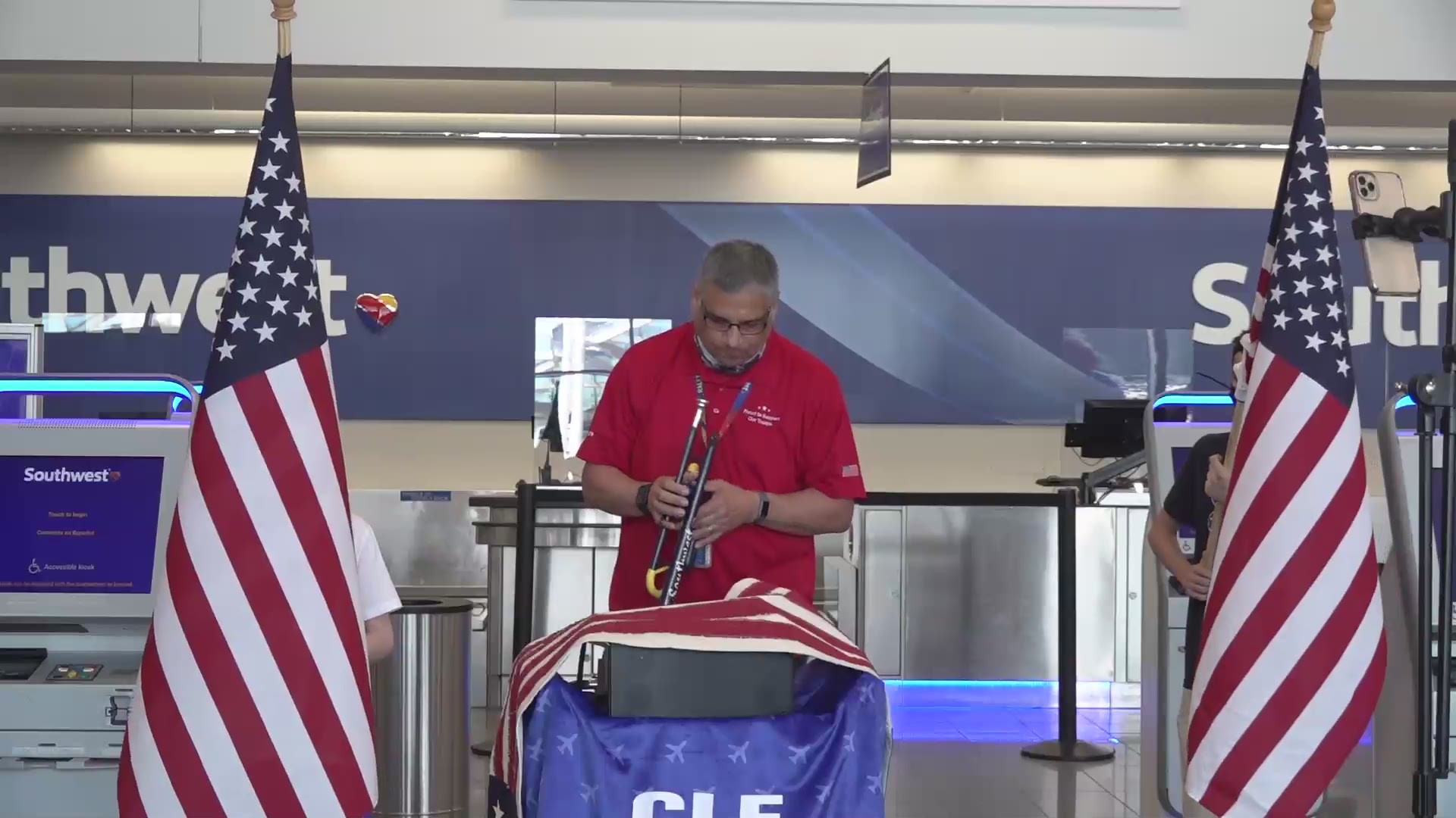 An Southwest Airlines employee at Cleveland Hopkins International Airport took part in Taps Across America to pay tribute to Memorial Day.