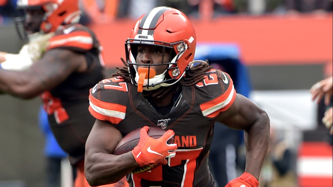 Cleveland Browns running back Nick Chubb (24) rushes at Buffalo Bills free  safety Jordan Poyer (21) and strong safety Micah Hyde (23) during an NFL  game on Sunday, Nov. 10, 2019 in