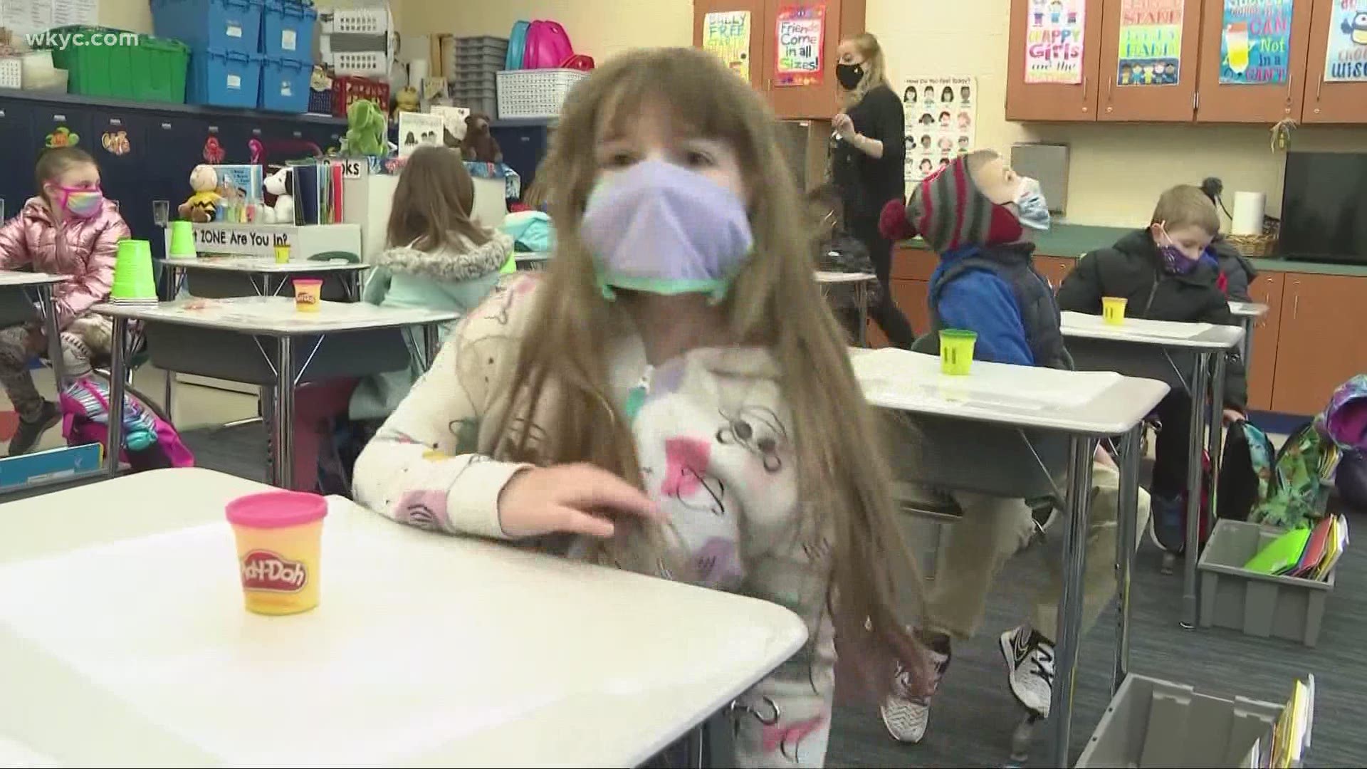 The debate over masks in schools heats up as kids near return to class.