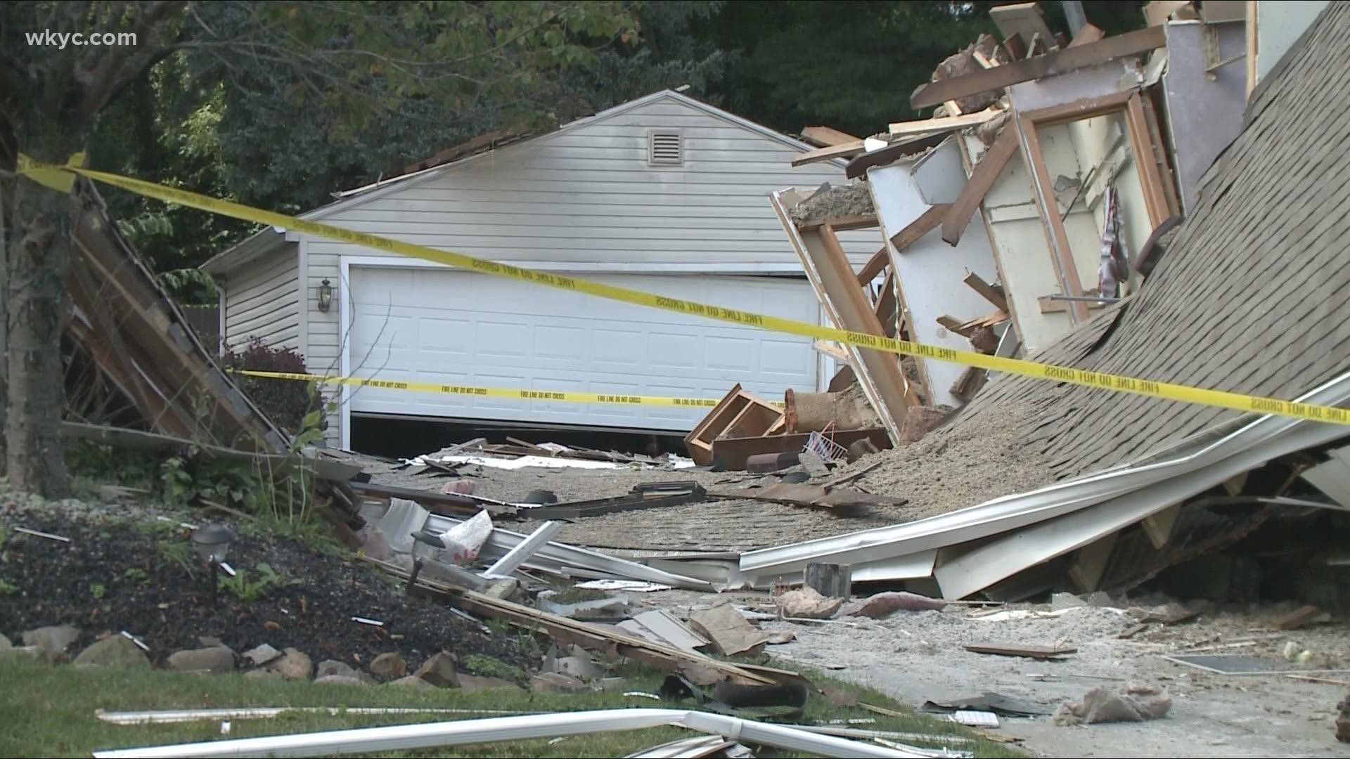 The Akron Fire Department is investigating the cause of the home collapse. One person was injured.