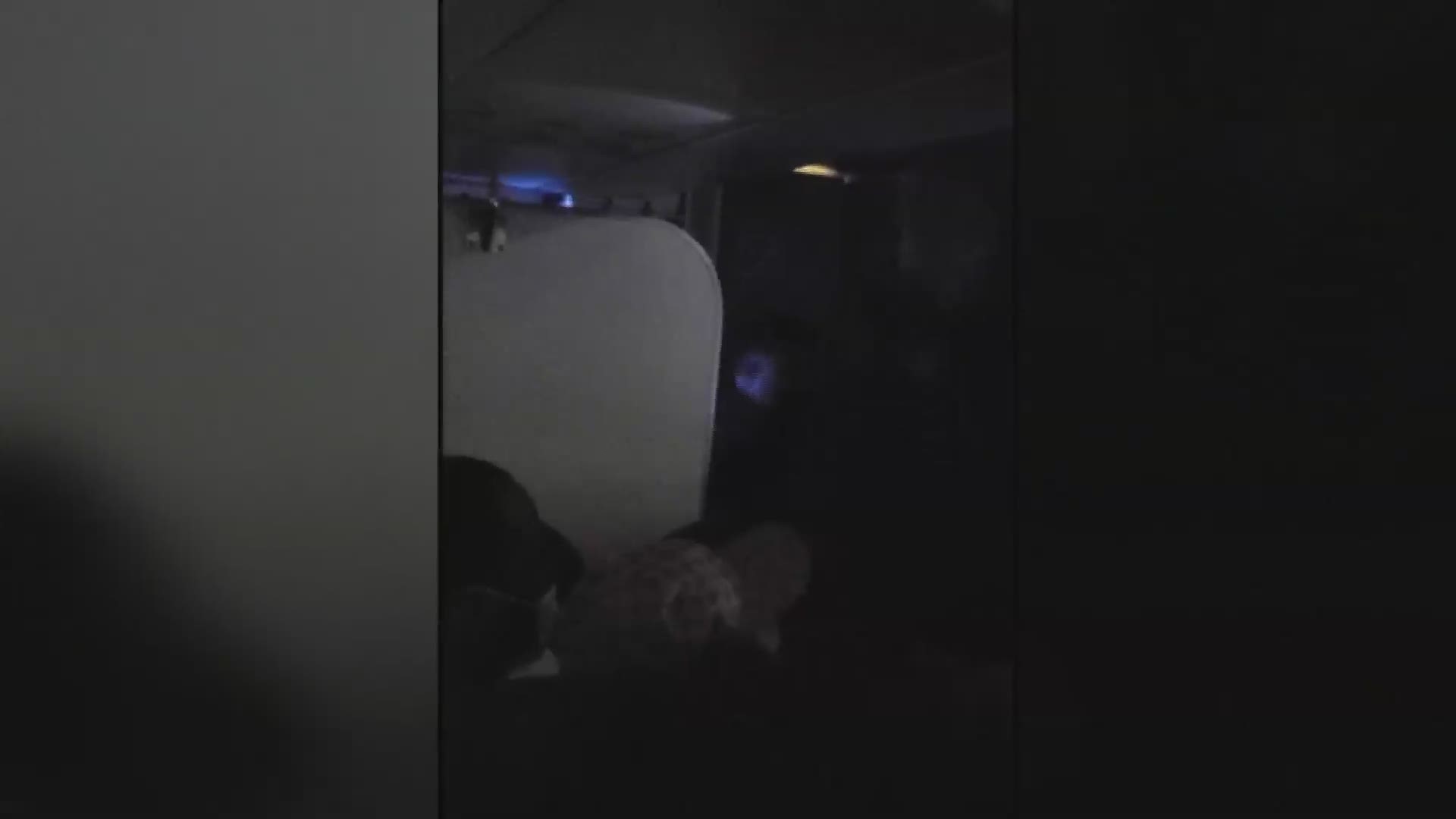 A passenger was wrestled to the floor of a Spirit Airlines plane after he tried to open and emergency exit door in mid-flight.