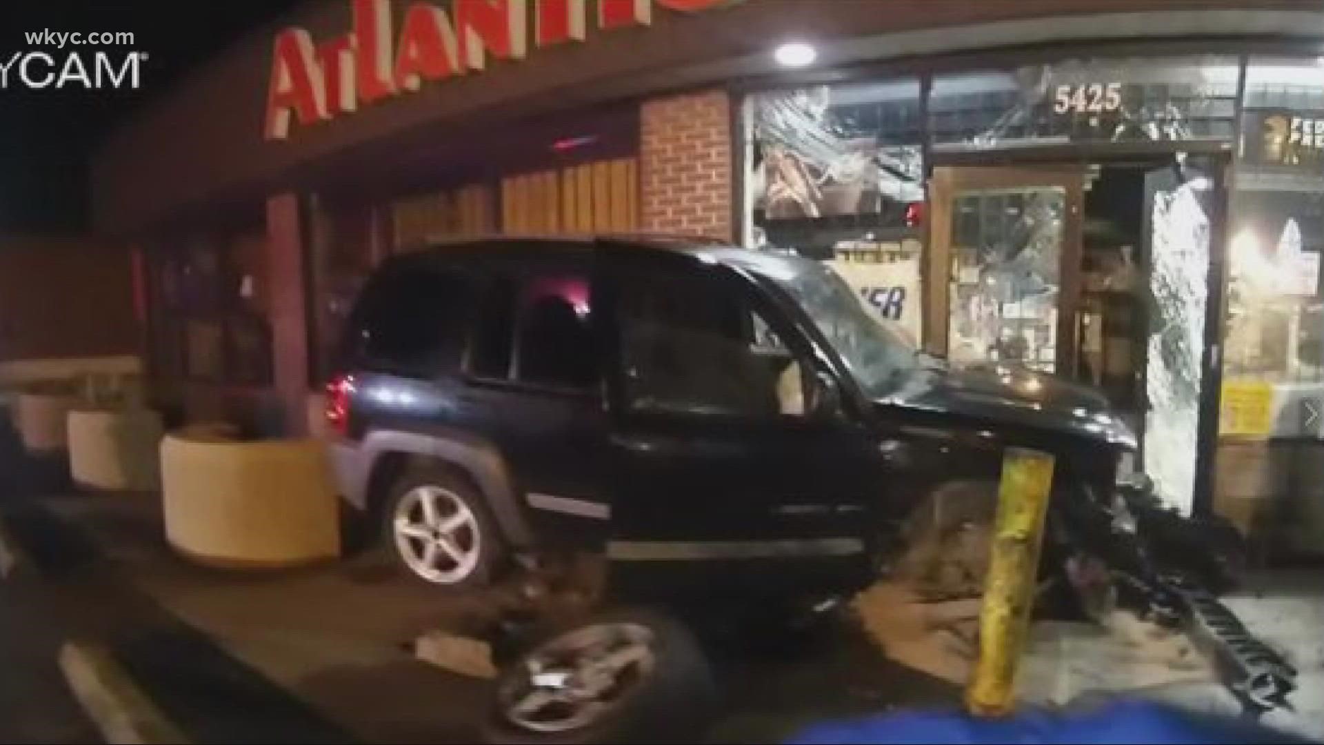 The suspects drove a car into Atlantic Gun and Tackle and stole the weapons. A $5,000 reward is being offered.