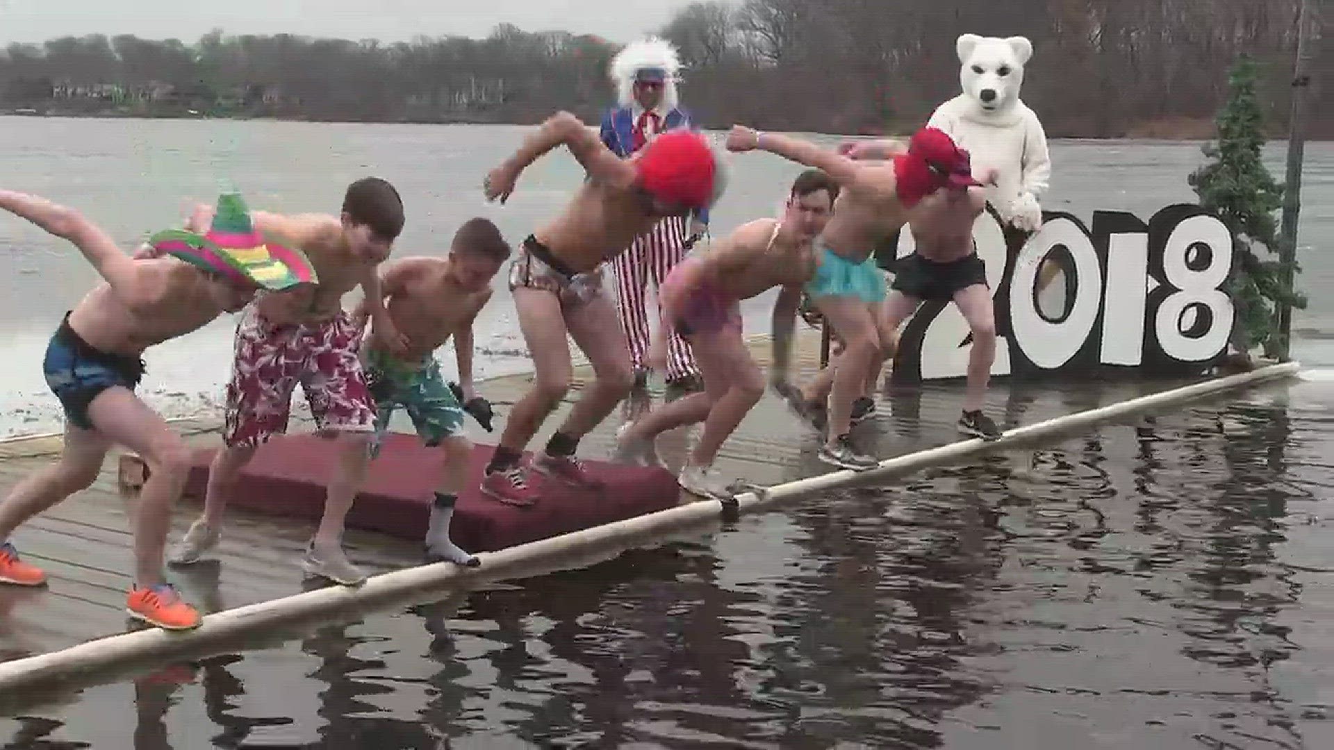 Feb. 17, 2018: More than 750 people traded their winter coats for bathing suits and flip-flops at the 15th Annual Portage Lakes Polar Bear Jump at Portage Lakes State Park. For those skipping traditional beachwear, many adorned their bodies in goofy costu