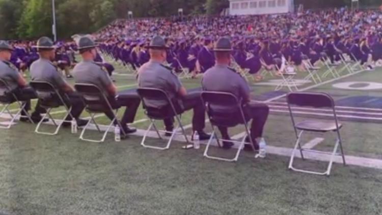 Ohio State Highway Patrol troopers stand in for fallen friend at son's high school graduation in Stark County