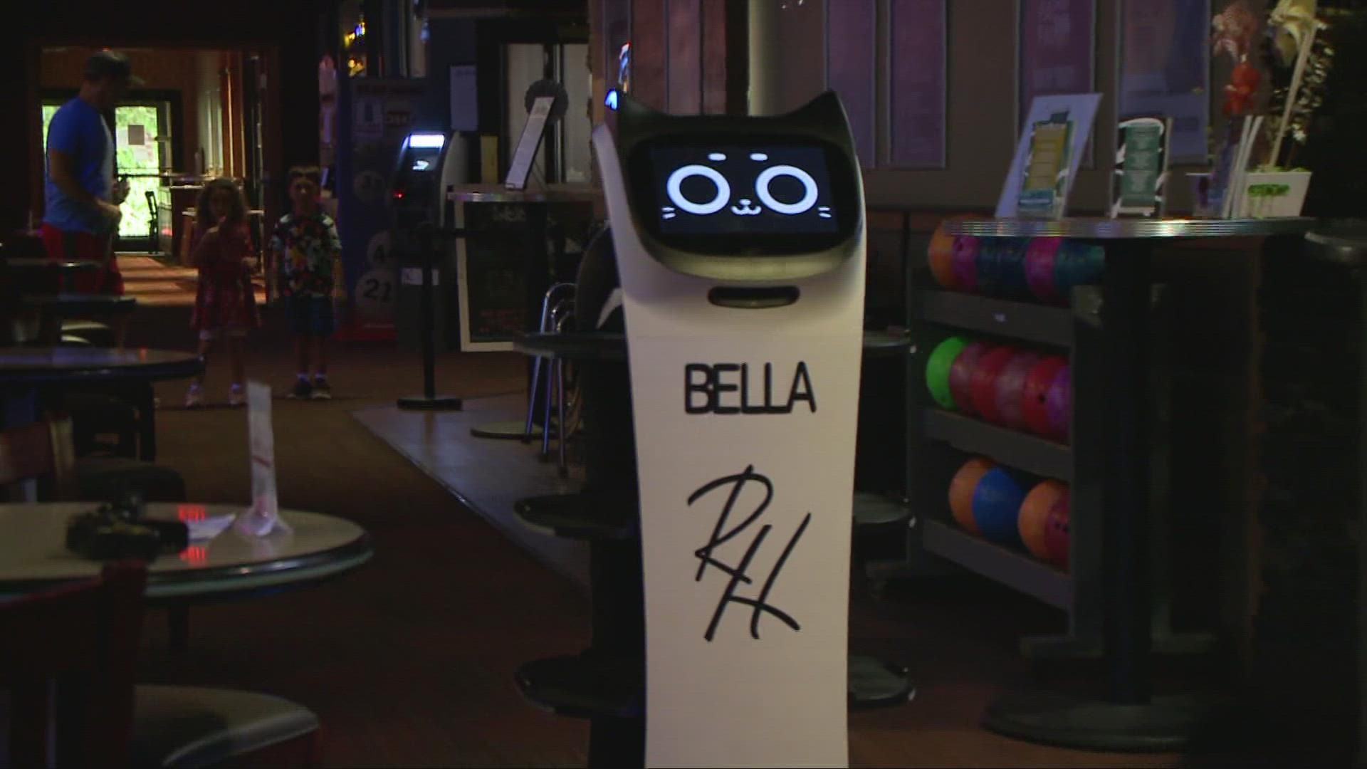 At RollHouse Solon, Bella the robot assists her human coworkers, delivering food to hungry customers