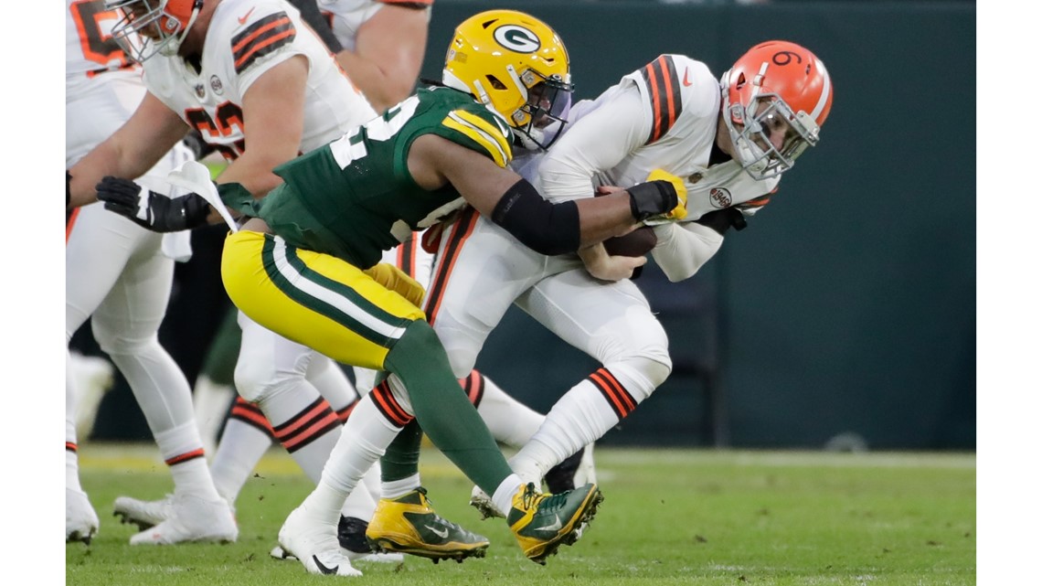 Rodgers sets Packers TD pass record in 24-22 win over Browns